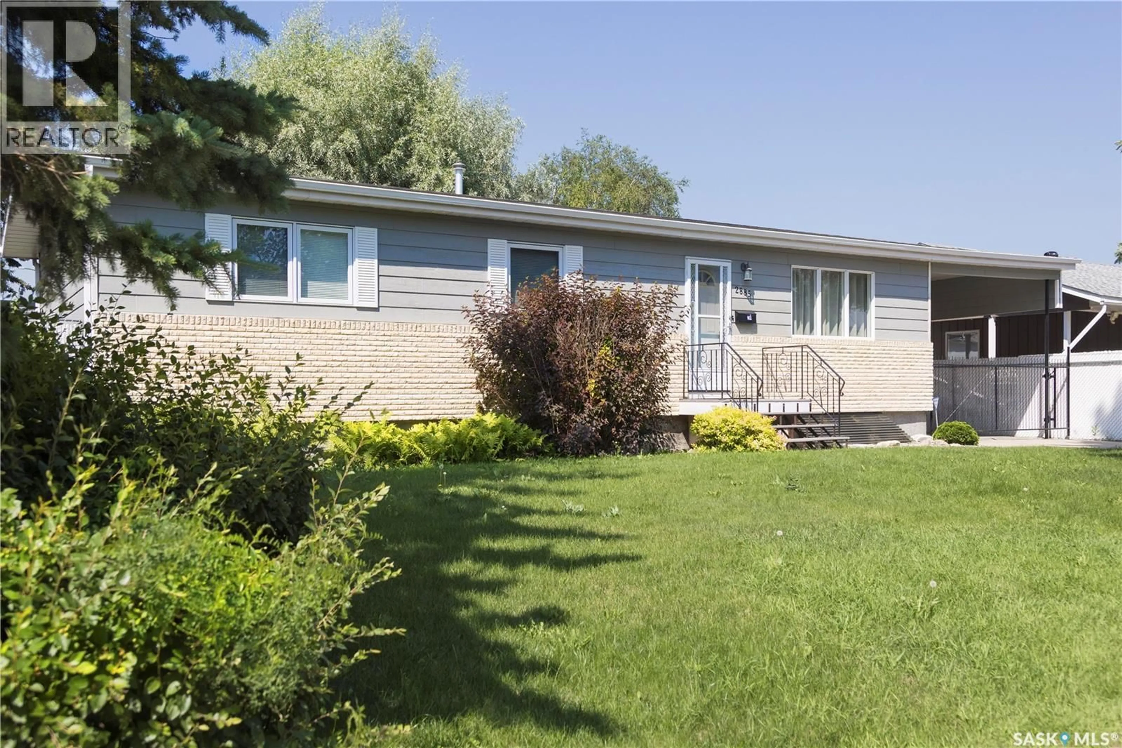 Home with vinyl exterior material, street for 2885 4TH AVENUE, Prince Albert Saskatchewan S6V5H9