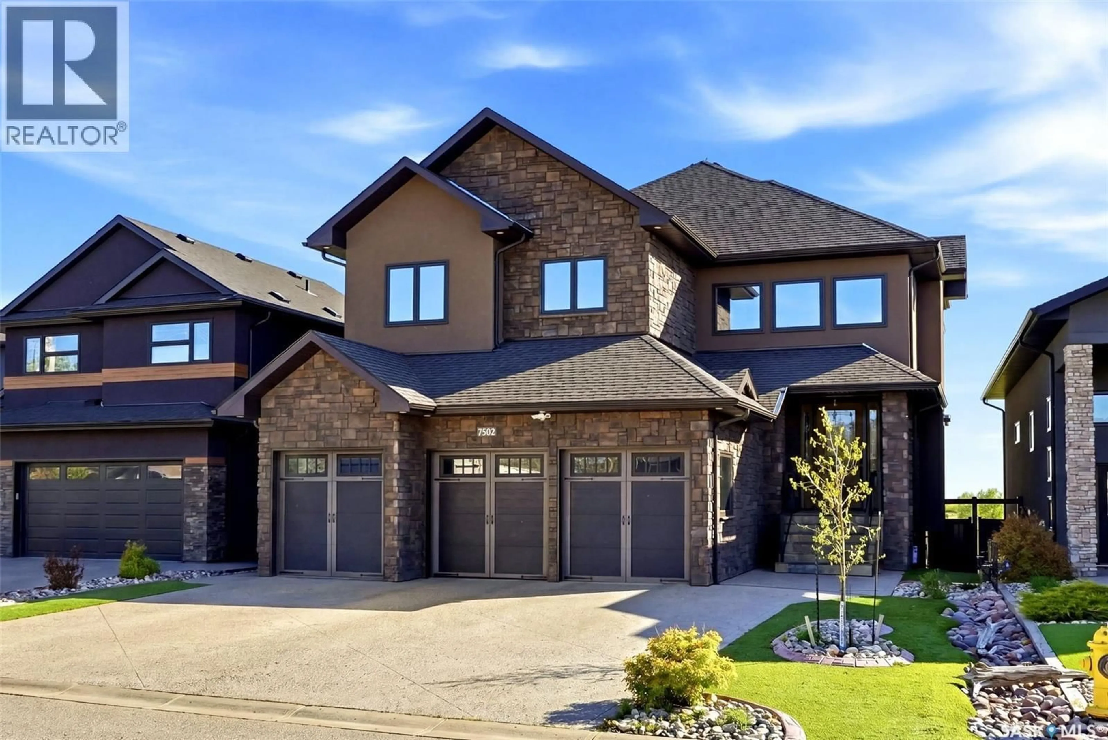 Home with brick exterior material, street for 7502 LILAC PLACE, Regina Saskatchewan S4Y0B3