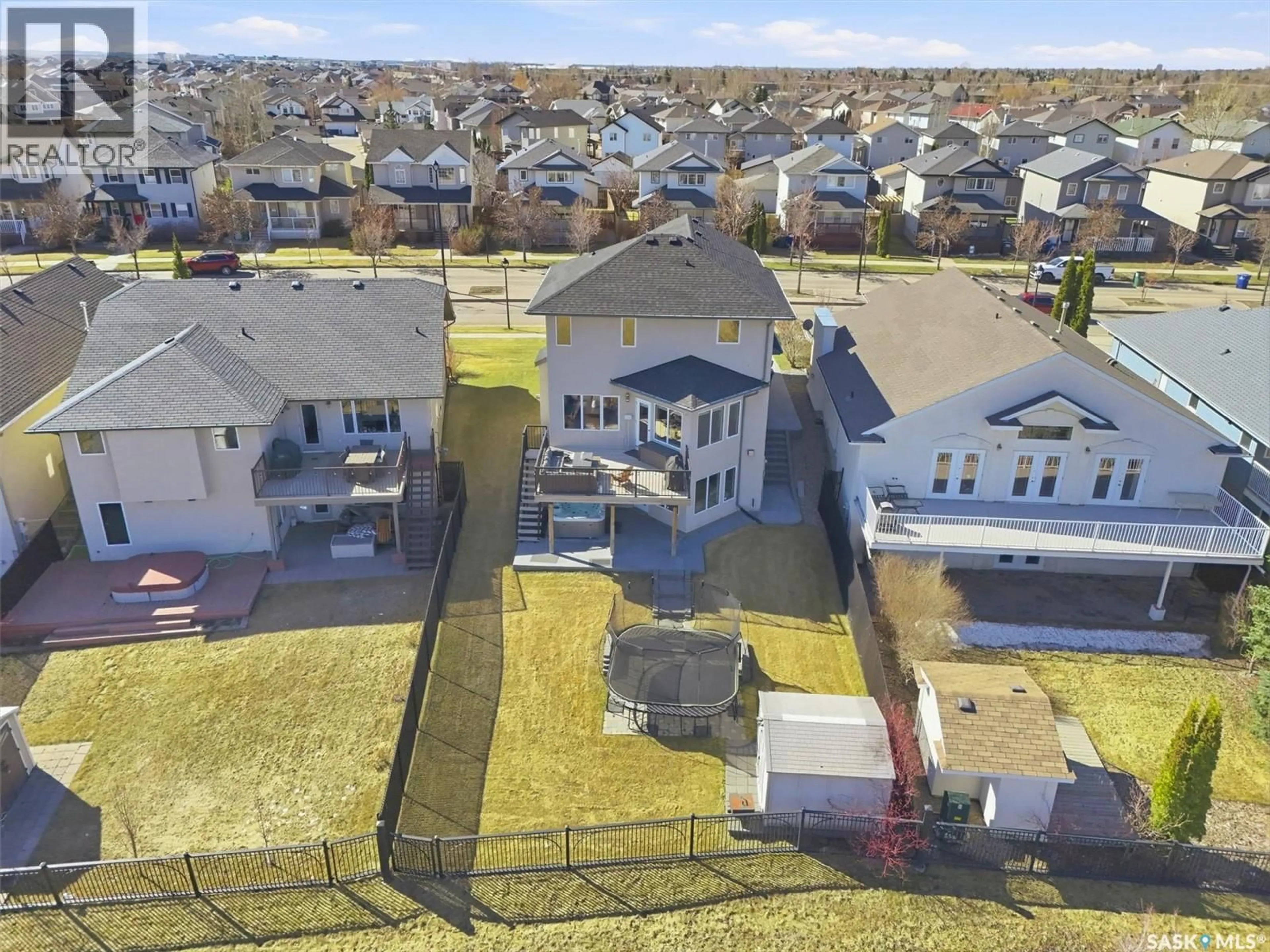A pic from outside/outdoor area/front of a property/back of a property/a pic from drone, water/lake/river/ocean view for 231 WILLOWGROVE BOULEVARD, Saskatoon Saskatchewan S7W1A1