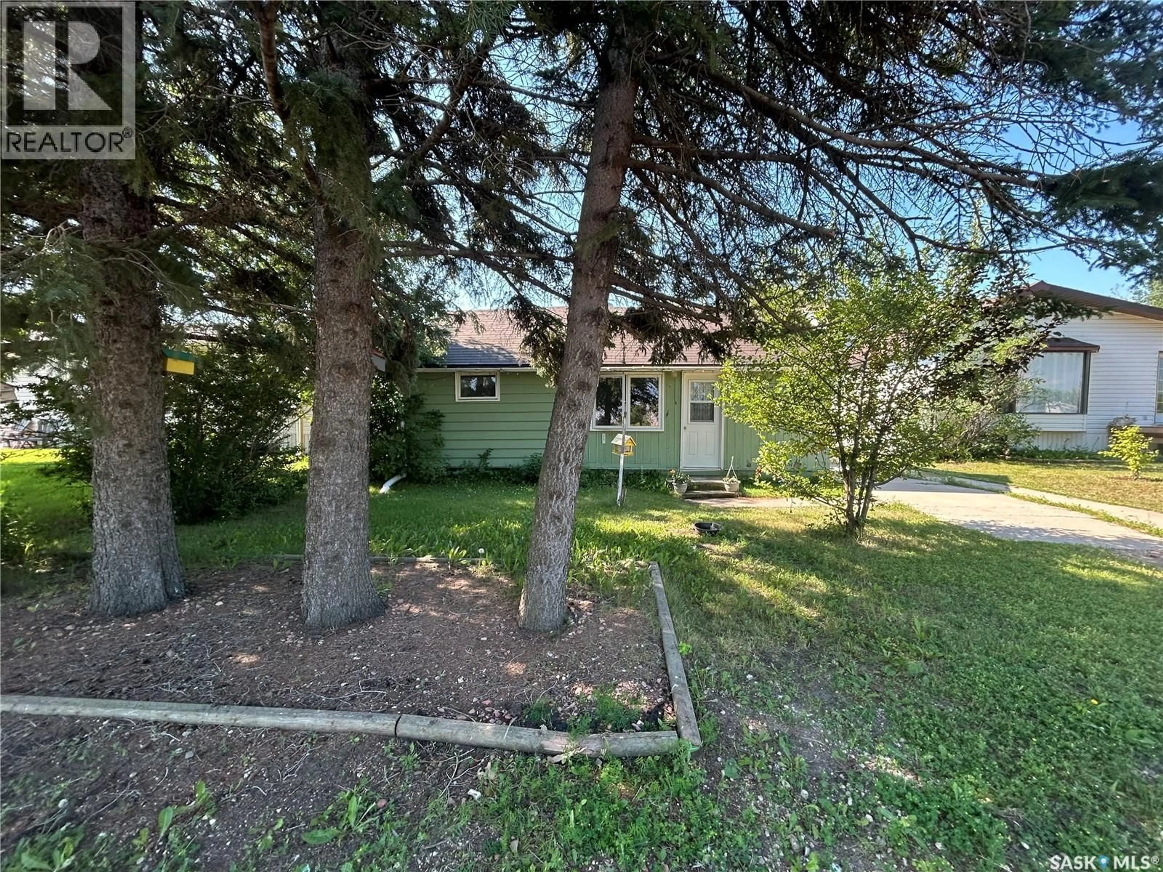 A pic from outside/outdoor area/front of a property/back of a property/a pic from drone, street for 804 96TH AVENUE, Tisdale Saskatchewan S0E1T0