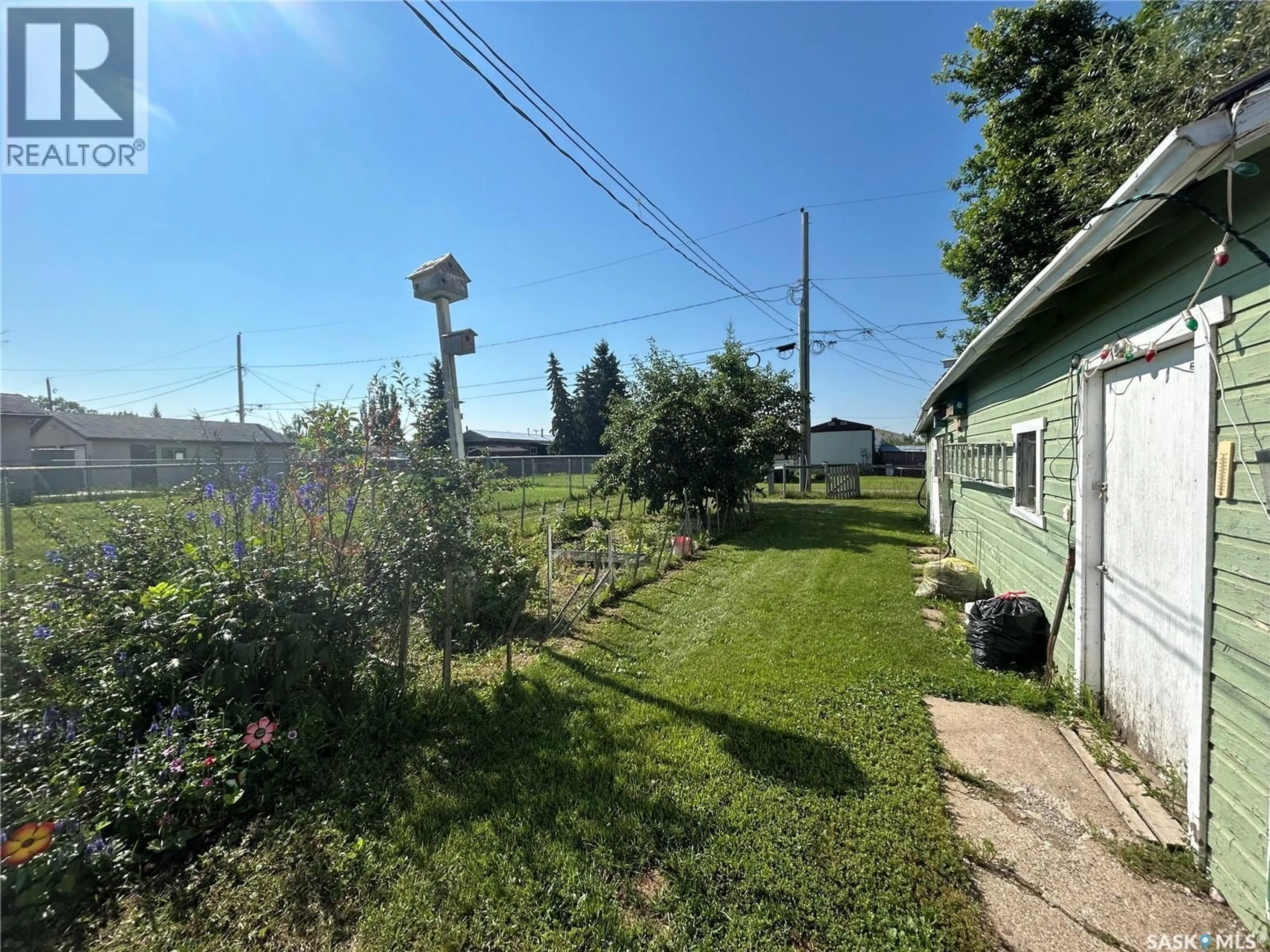 A pic from outside/outdoor area/front of a property/back of a property/a pic from drone, street for 804 96TH AVENUE, Tisdale Saskatchewan S0E1T0