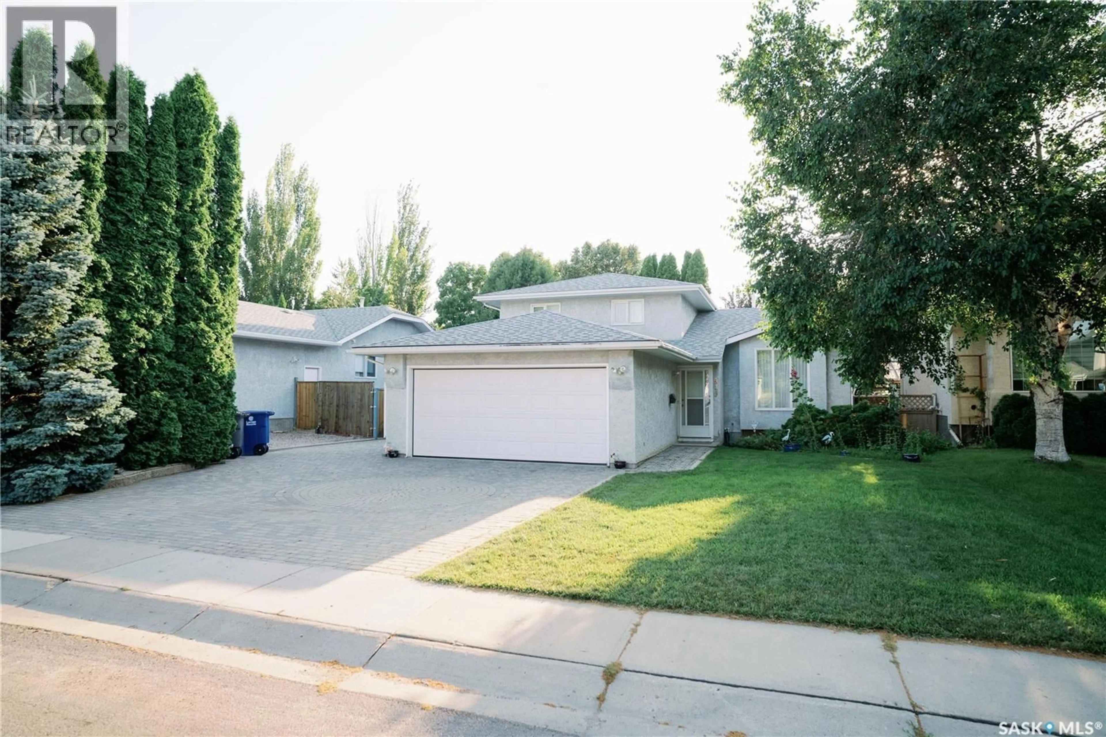 Home with vinyl exterior material, street for 939 HASLAM CRESCENT, Saskatoon Saskatchewan S7S1C8