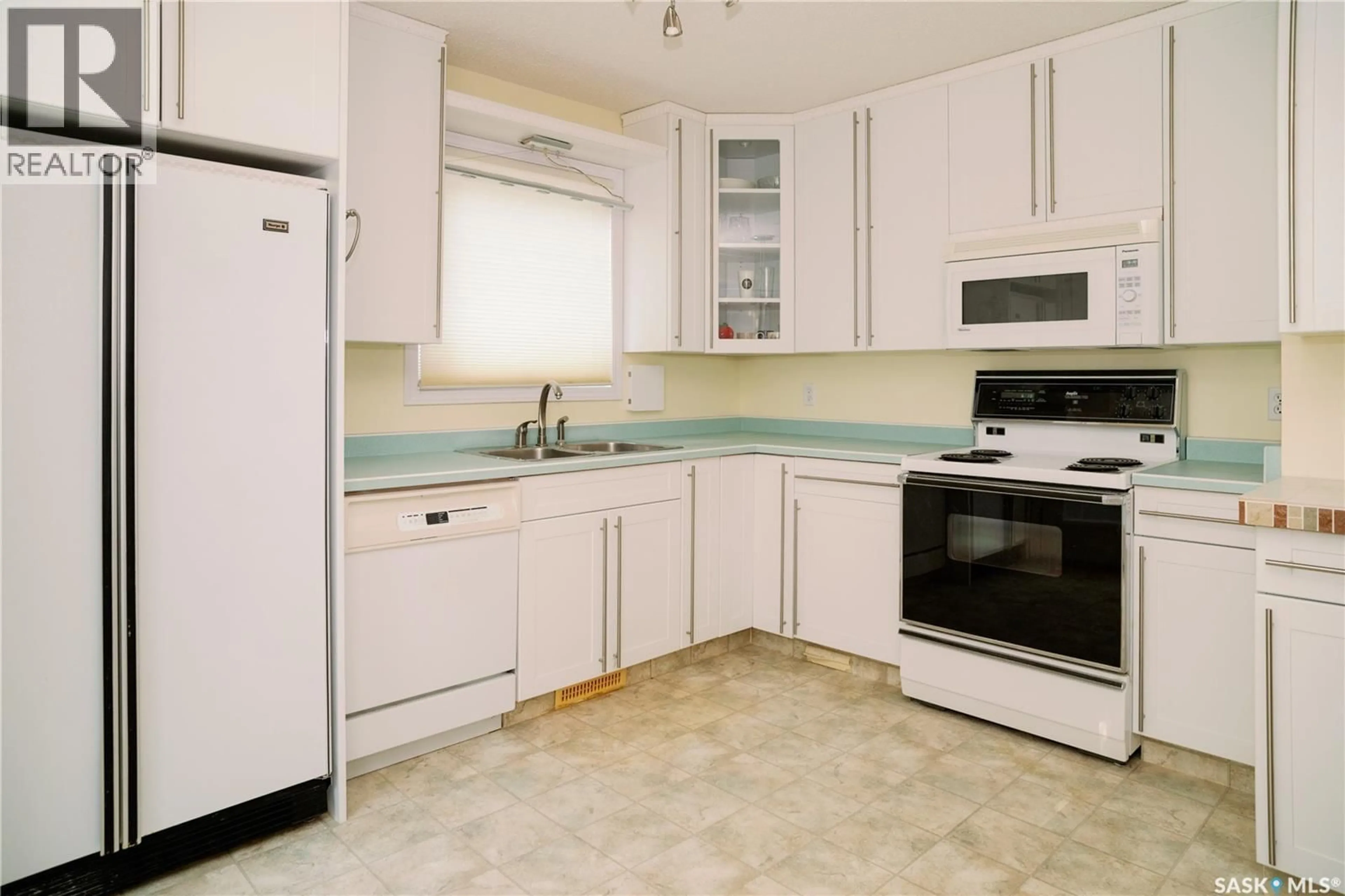 Standard kitchen, ceramic/tile floor for 939 HASLAM CRESCENT, Saskatoon Saskatchewan S7S1C8