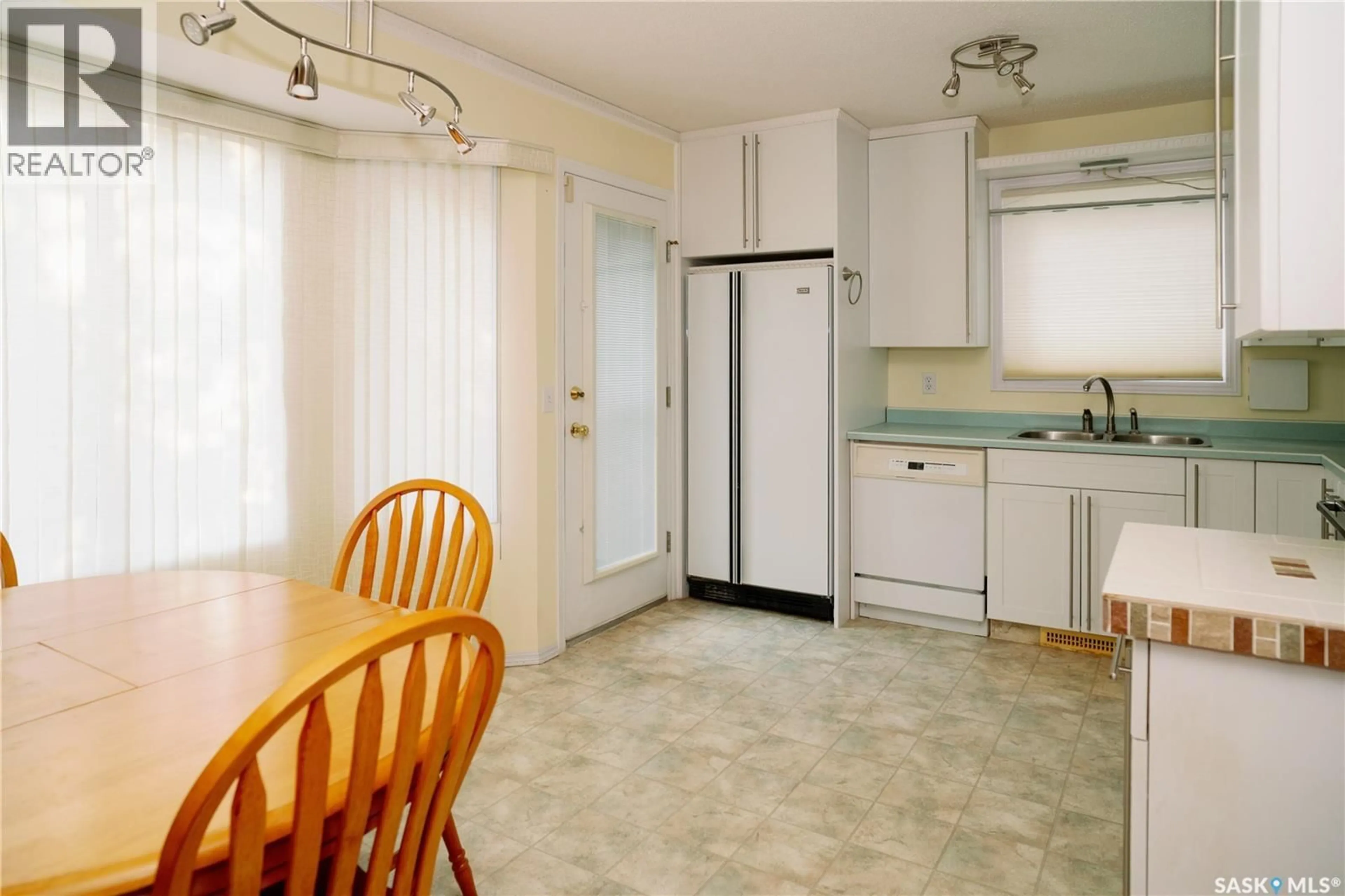 Standard kitchen, ceramic/tile floor for 939 HASLAM CRESCENT, Saskatoon Saskatchewan S7S1C8