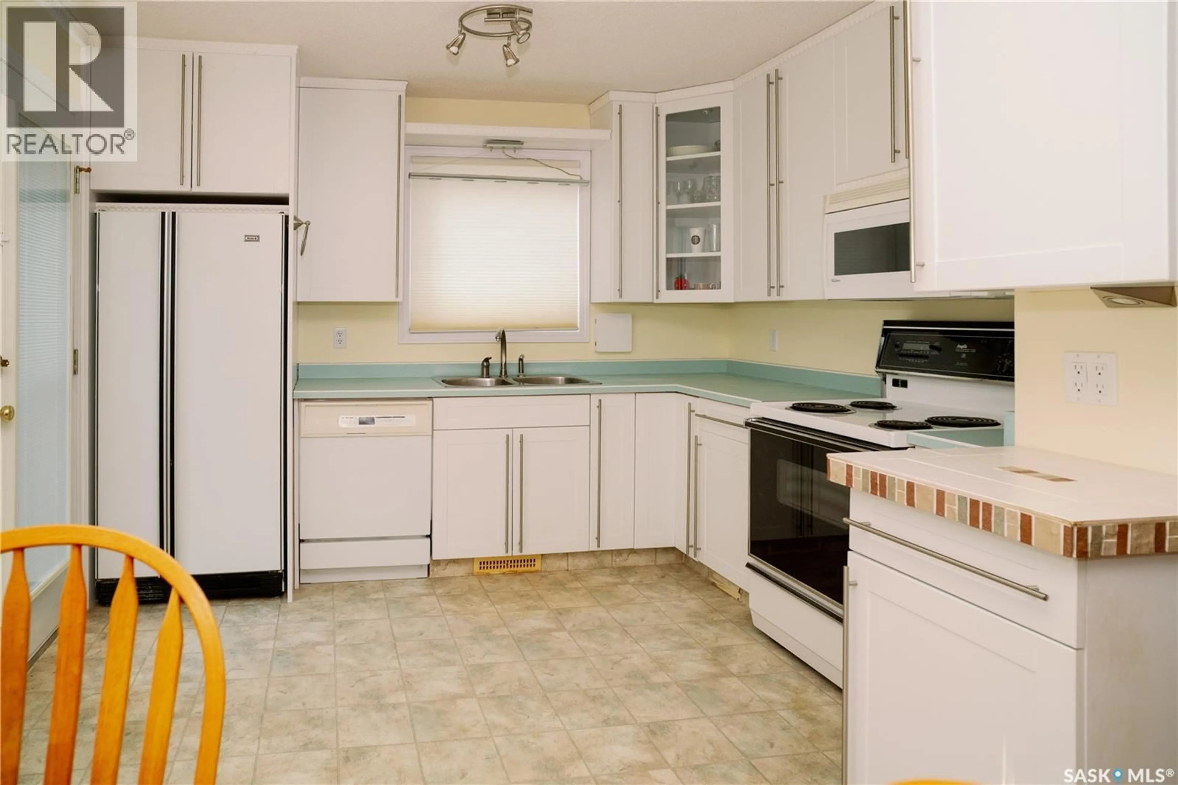 Standard kitchen, ceramic/tile floor for 939 HASLAM CRESCENT, Saskatoon Saskatchewan S7S1C8