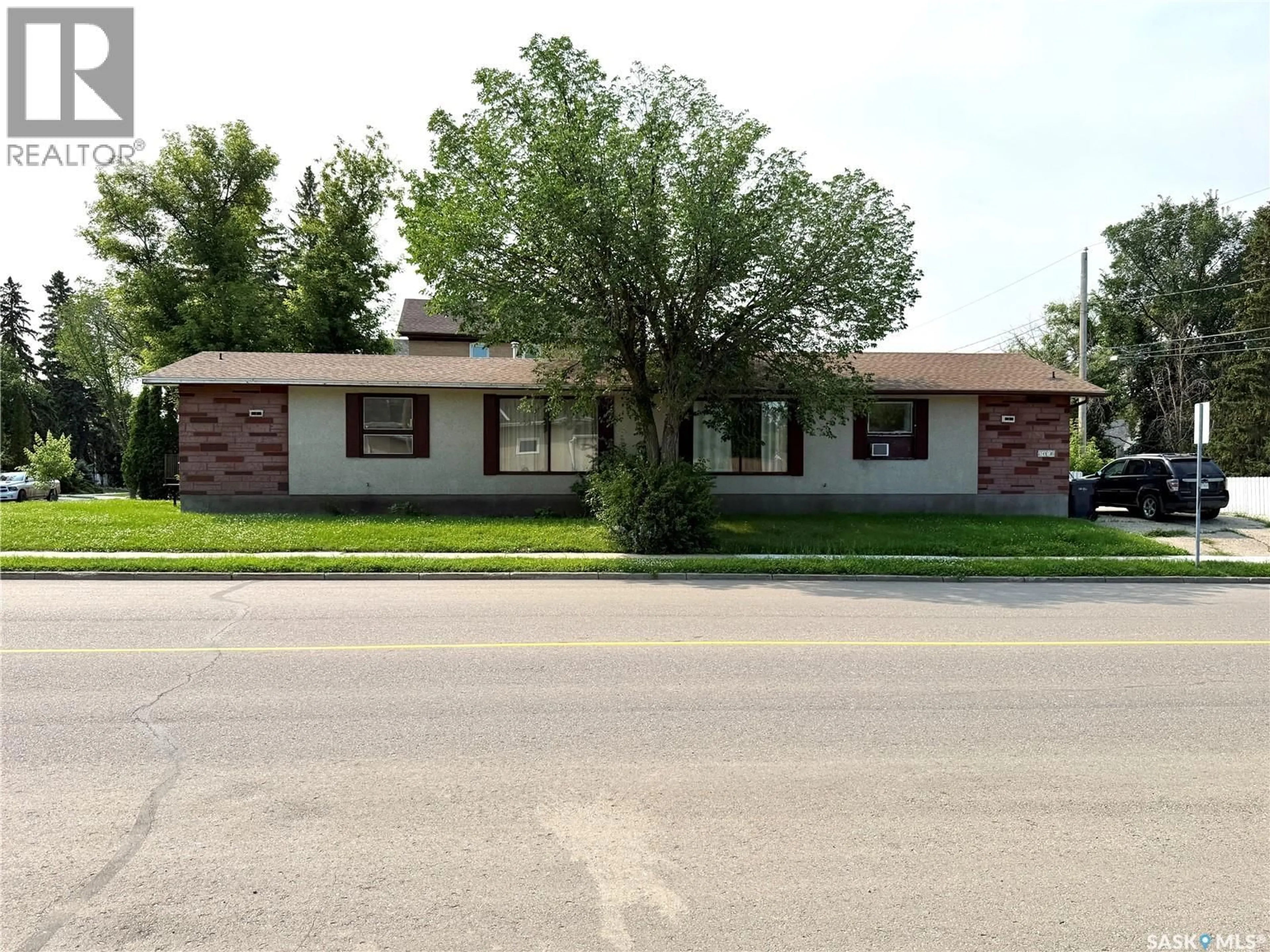 Home with brick exterior material, street for A/B - 1491 98TH STREET, North Battleford Saskatchewan S9A0M3
