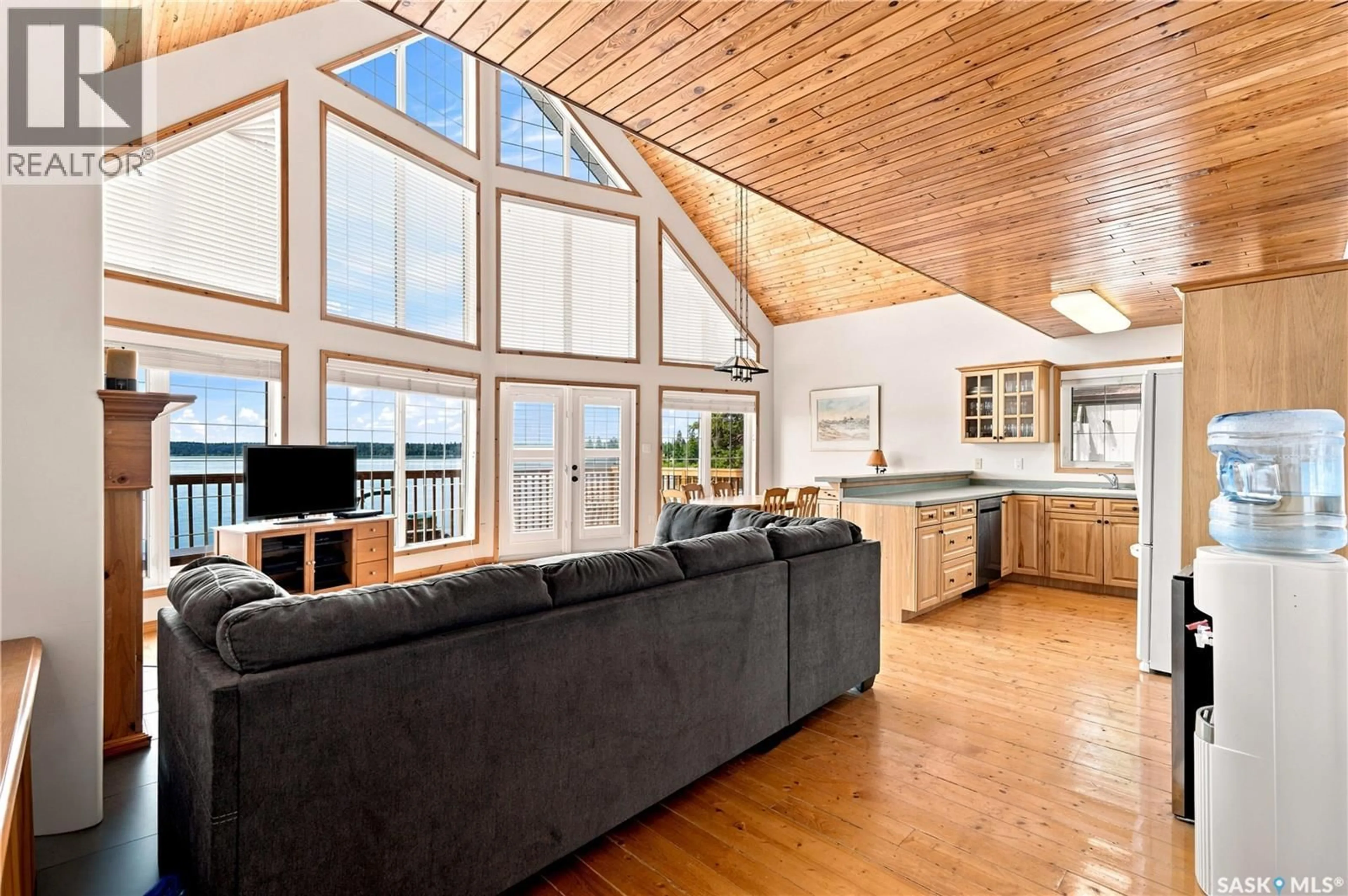 Open concept kitchen, wood/laminate floor for 322 NEIS DRIVE, Emma Lake Saskatchewan S0J0N0