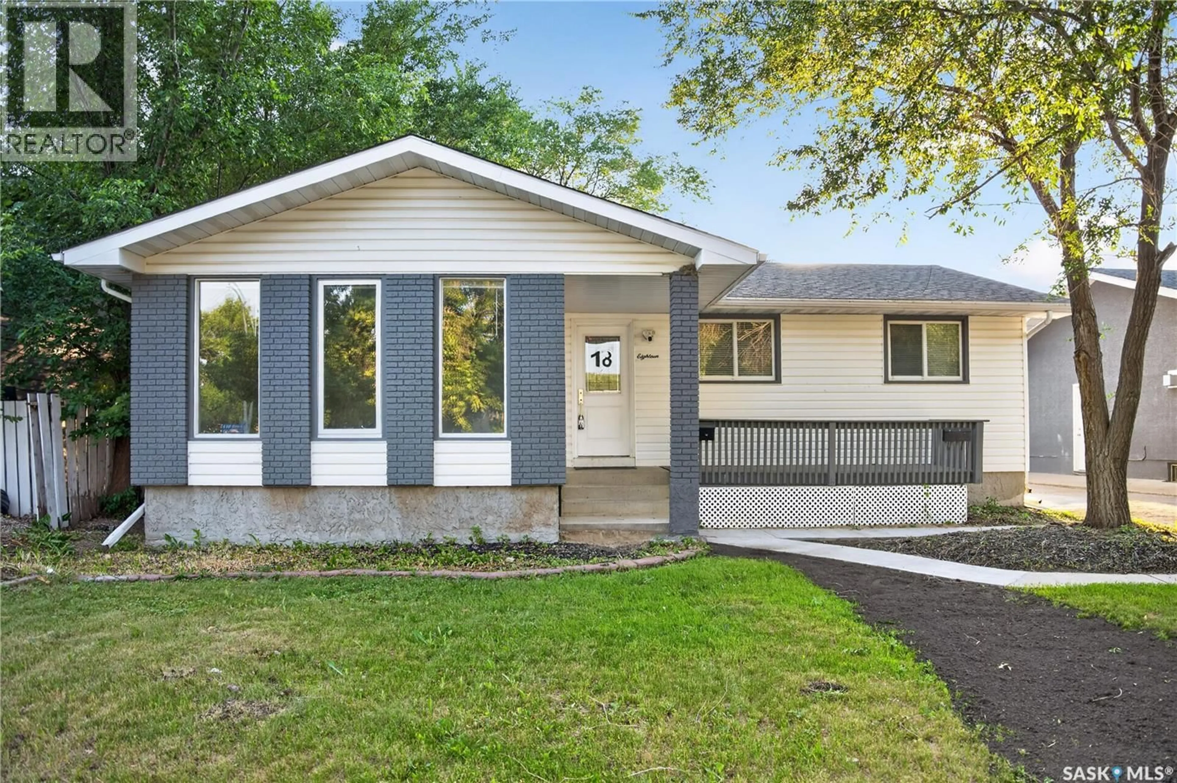 Home with vinyl exterior material, street for 18 UNIVERSITY PARK DRIVE, Regina Saskatchewan S4V0C9