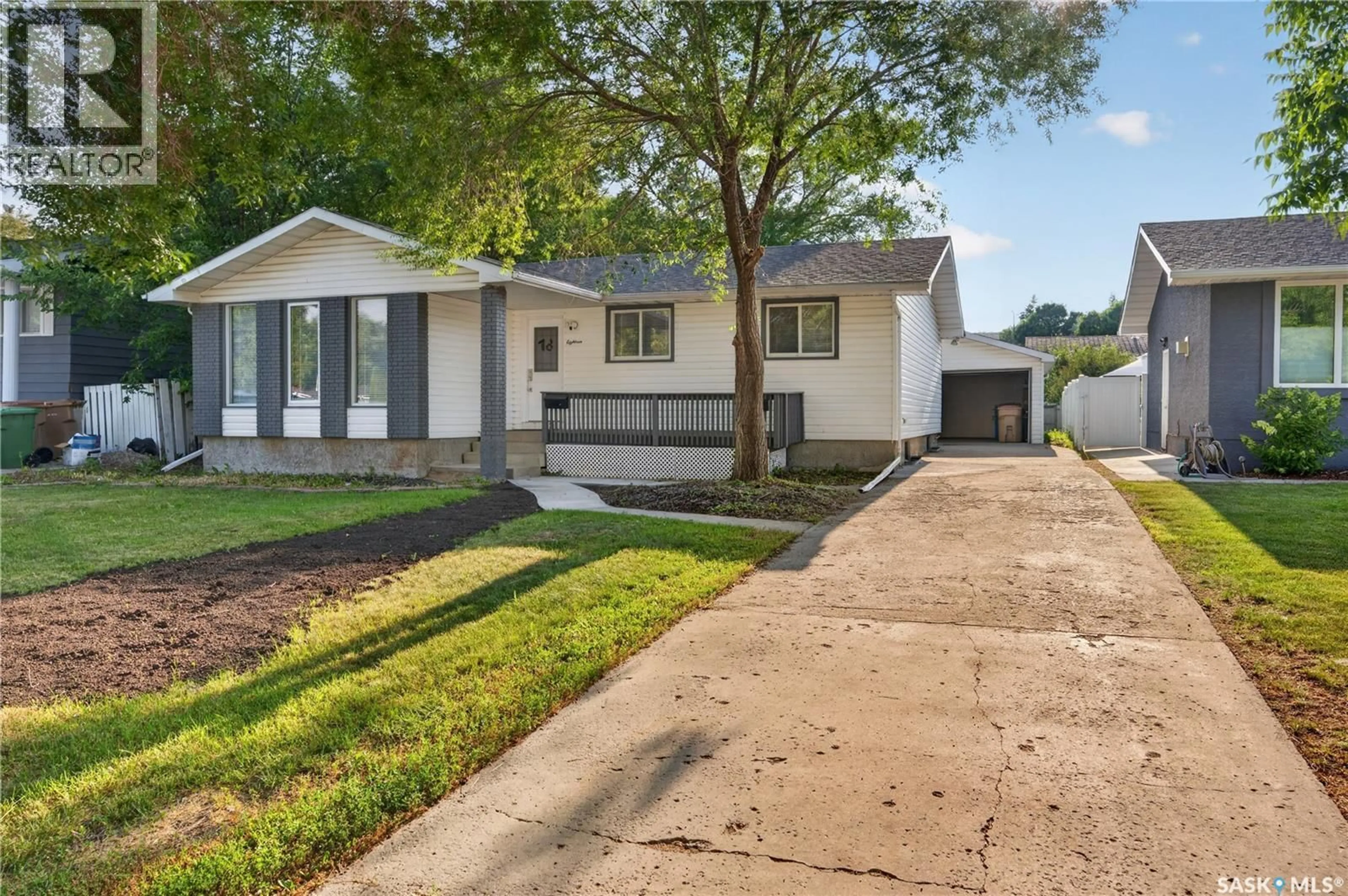 Home with vinyl exterior material, street for 18 UNIVERSITY PARK DRIVE, Regina Saskatchewan S4V0C9
