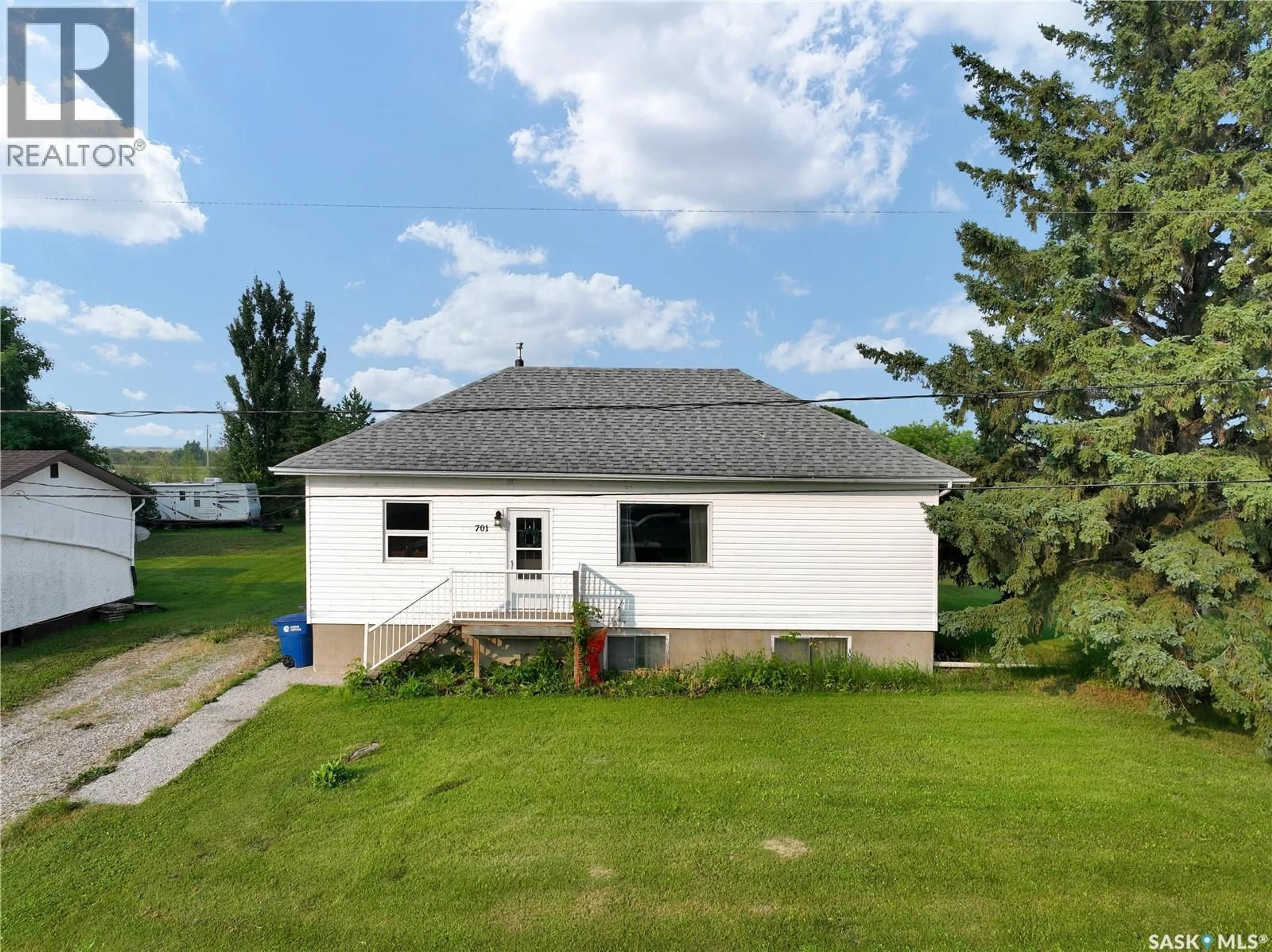 A pic from outside/outdoor area/front of a property/back of a property/a pic from drone, unknown for 701 3RD AVENUE, Spy Hill Saskatchewan S0A3W0