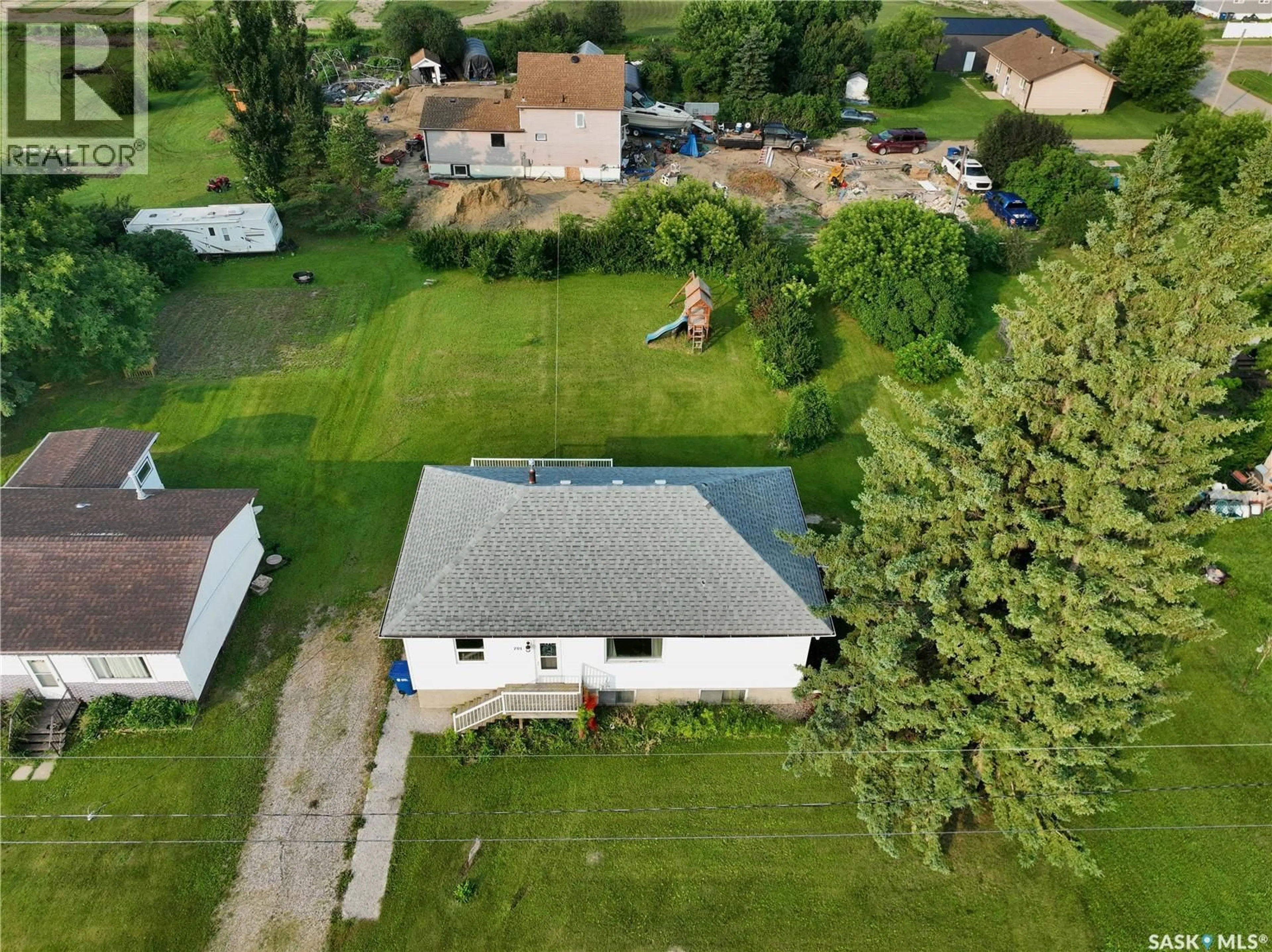 A pic from outside/outdoor area/front of a property/back of a property/a pic from drone, street for 701 3RD AVENUE, Spy Hill Saskatchewan S0A3W0
