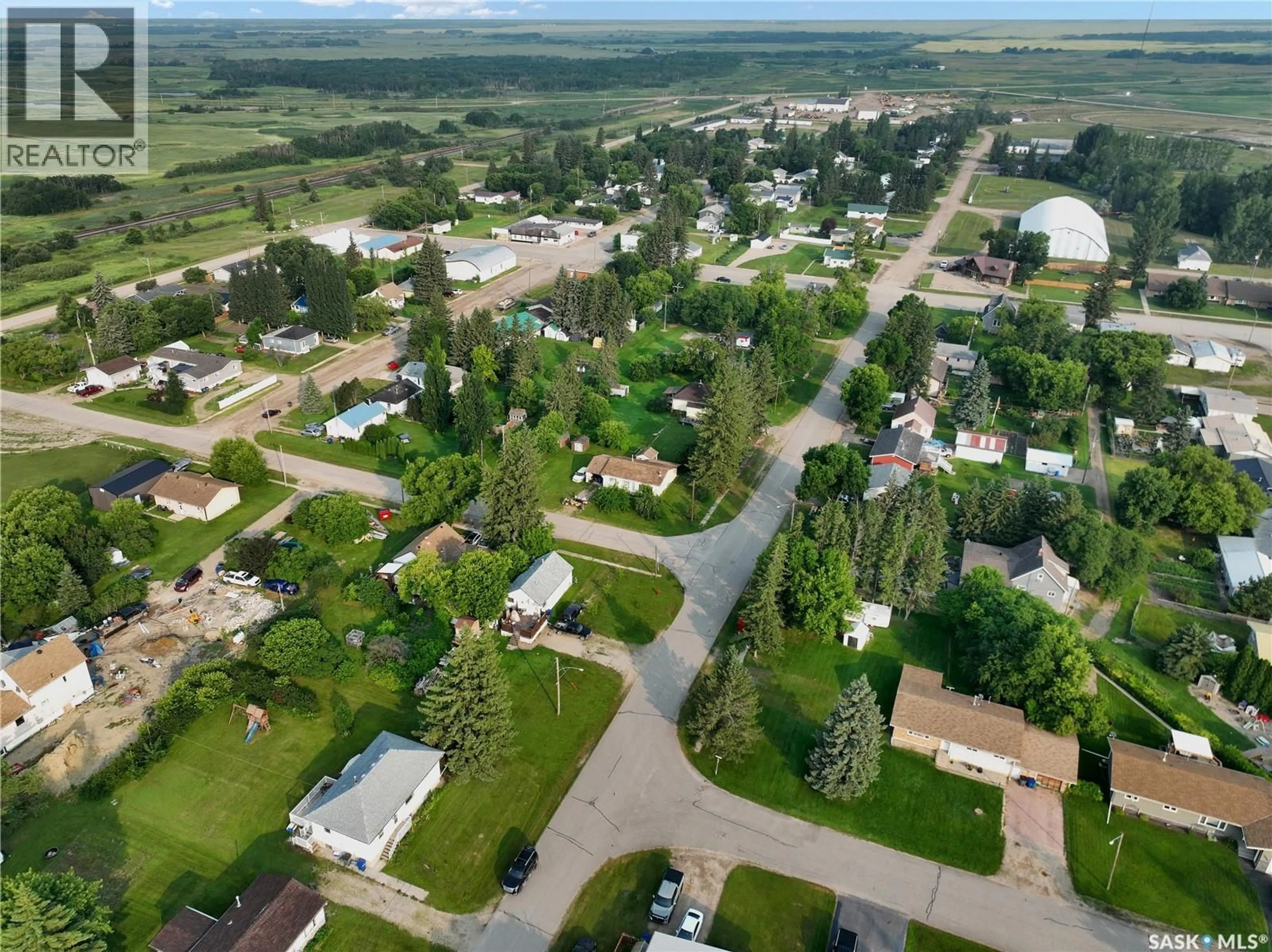 A pic from outside/outdoor area/front of a property/back of a property/a pic from drone, street for 701 3RD AVENUE, Spy Hill Saskatchewan S0A3W0
