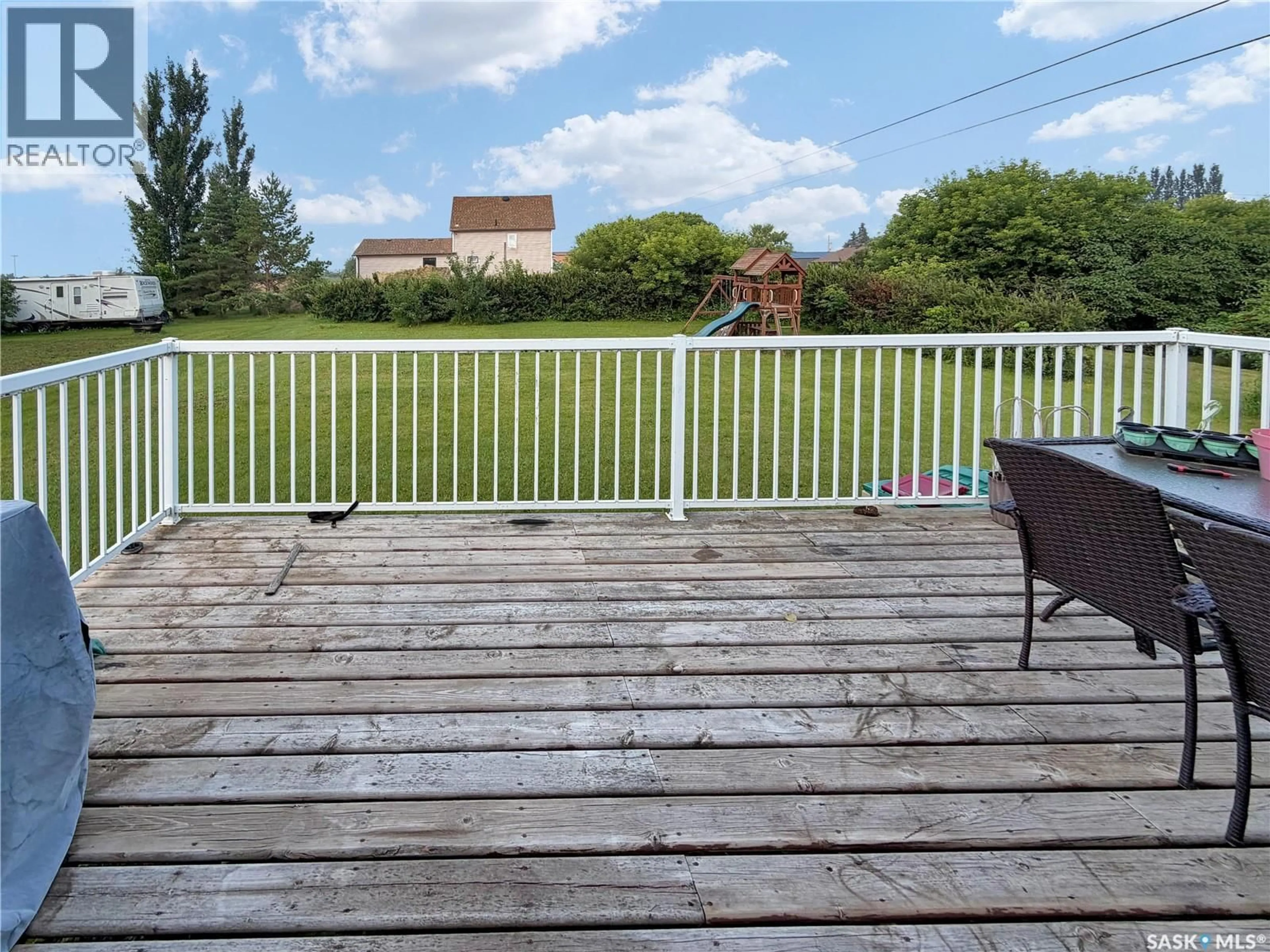 A pic from outside/outdoor area/front of a property/back of a property/a pic from drone, water/lake/river/ocean view for 701 3RD AVENUE, Spy Hill Saskatchewan S0A3W0