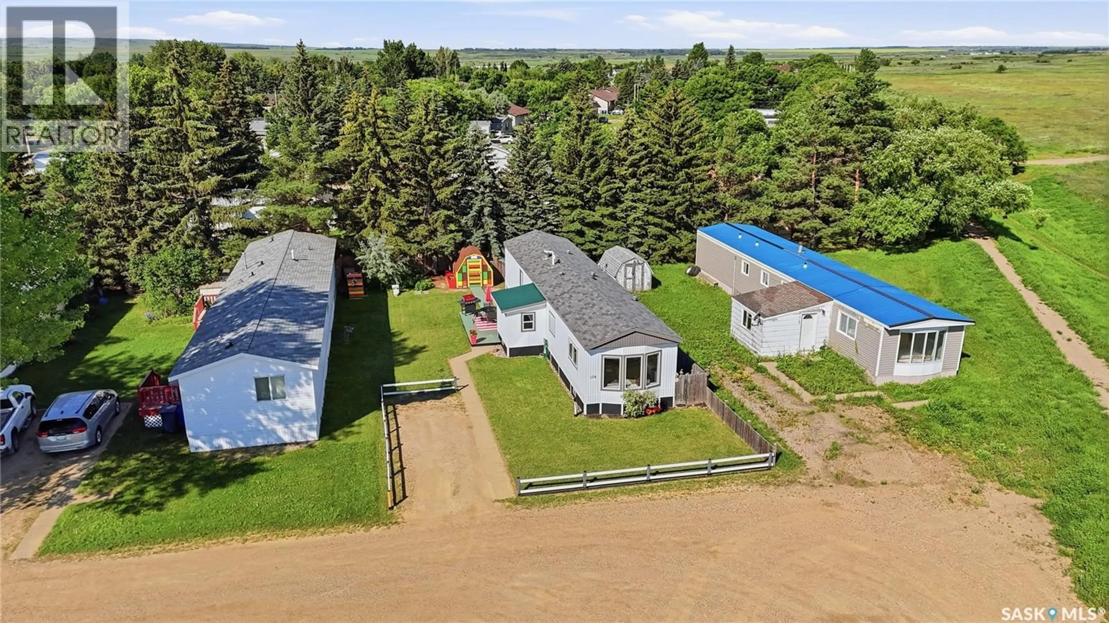 A pic from outside/outdoor area/front of a property/back of a property/a pic from drone, unknown for 134 SPRUCE STREET, Caronport Saskatchewan S0H0S0
