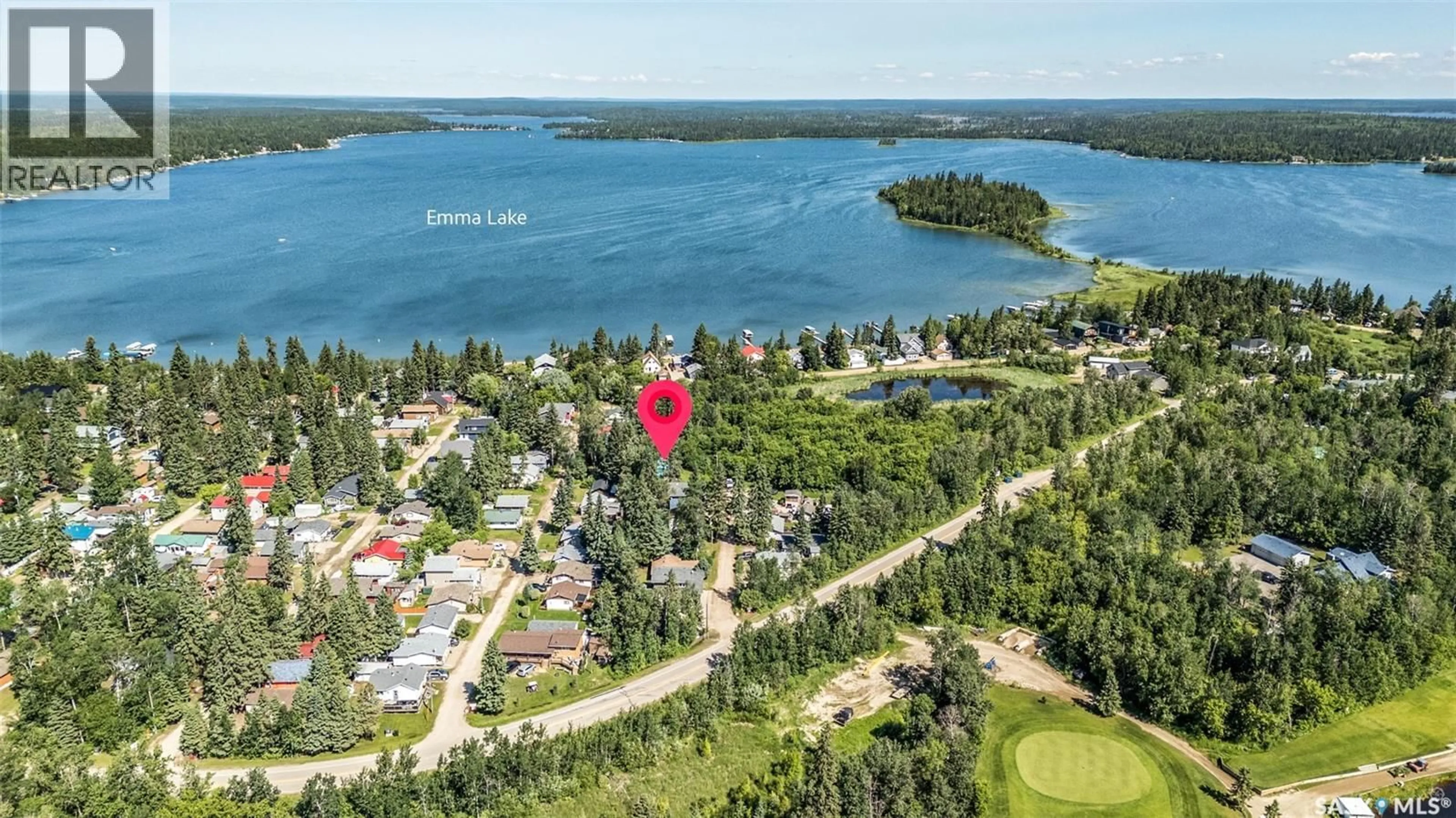 A pic from outside/outdoor area/front of a property/back of a property/a pic from drone, water/lake/river/ocean view for 2B 9TH STREET, Emma Lake Saskatchewan S0J0N0