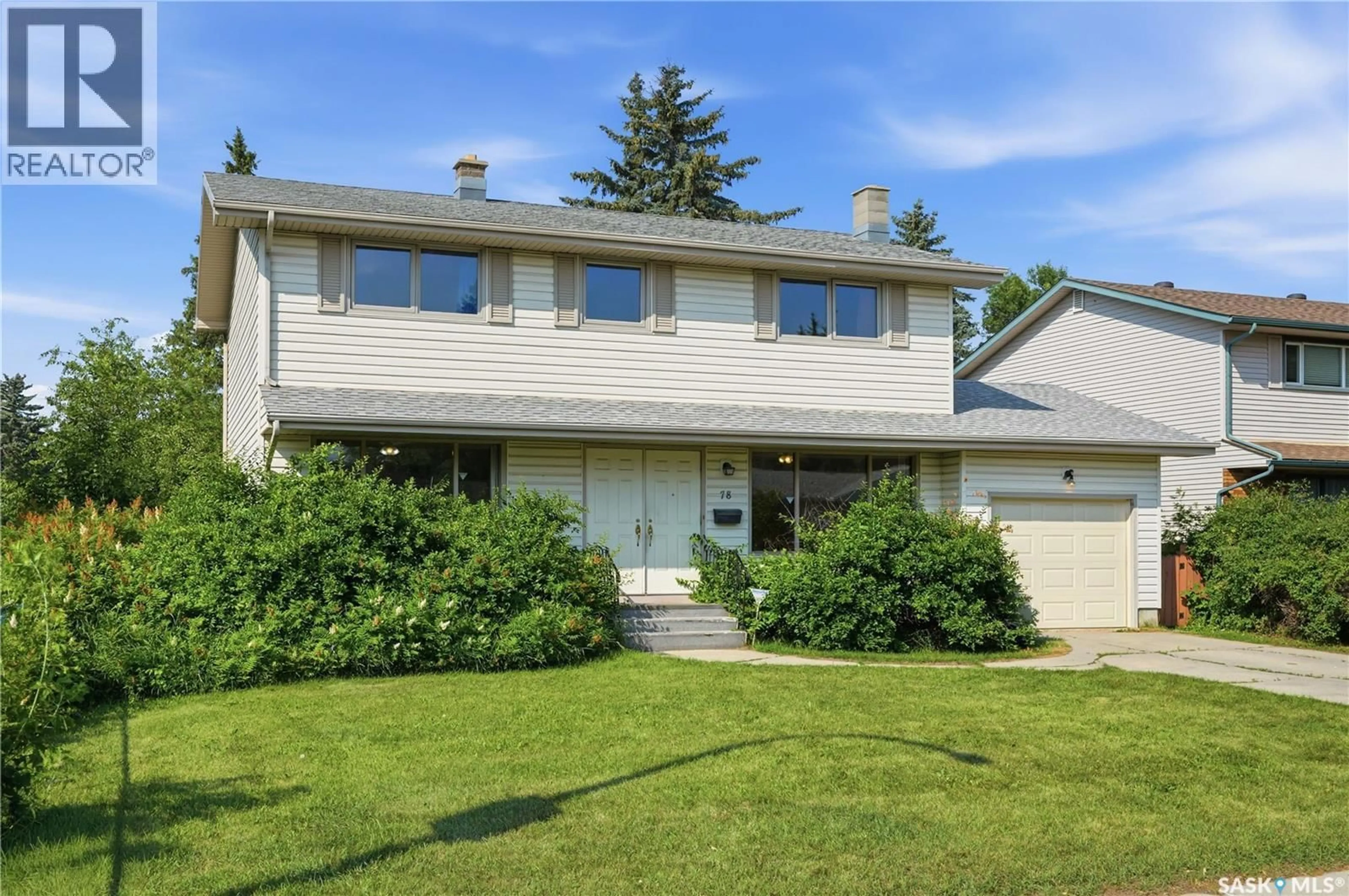 Home with vinyl exterior material, street for 78 HARVARD CRESCENT, Saskatoon Saskatchewan S7H3R1