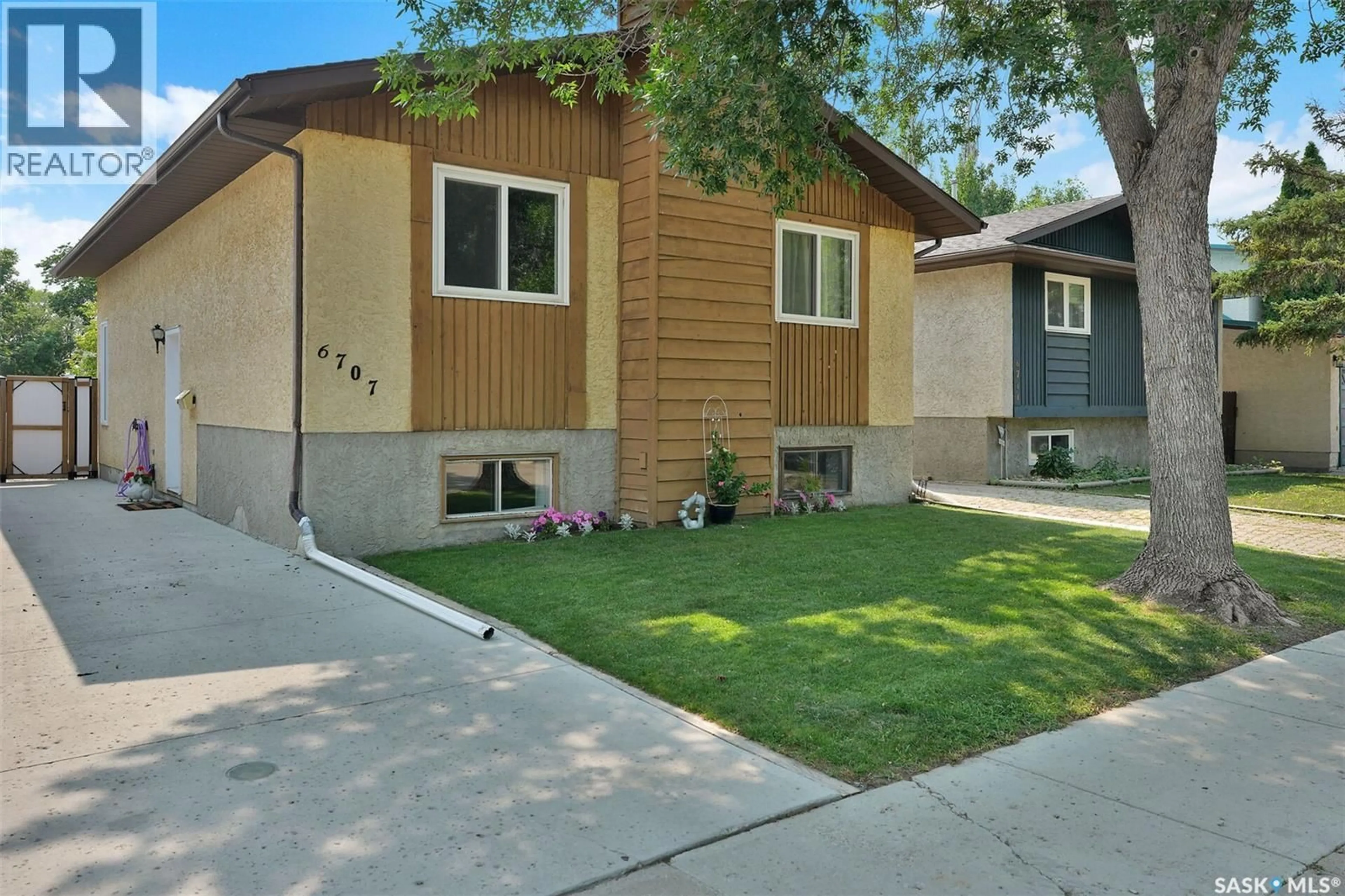 Home with vinyl exterior material, street for 6707 MAWSON AVENUE, Regina Saskatchewan S4X2P2