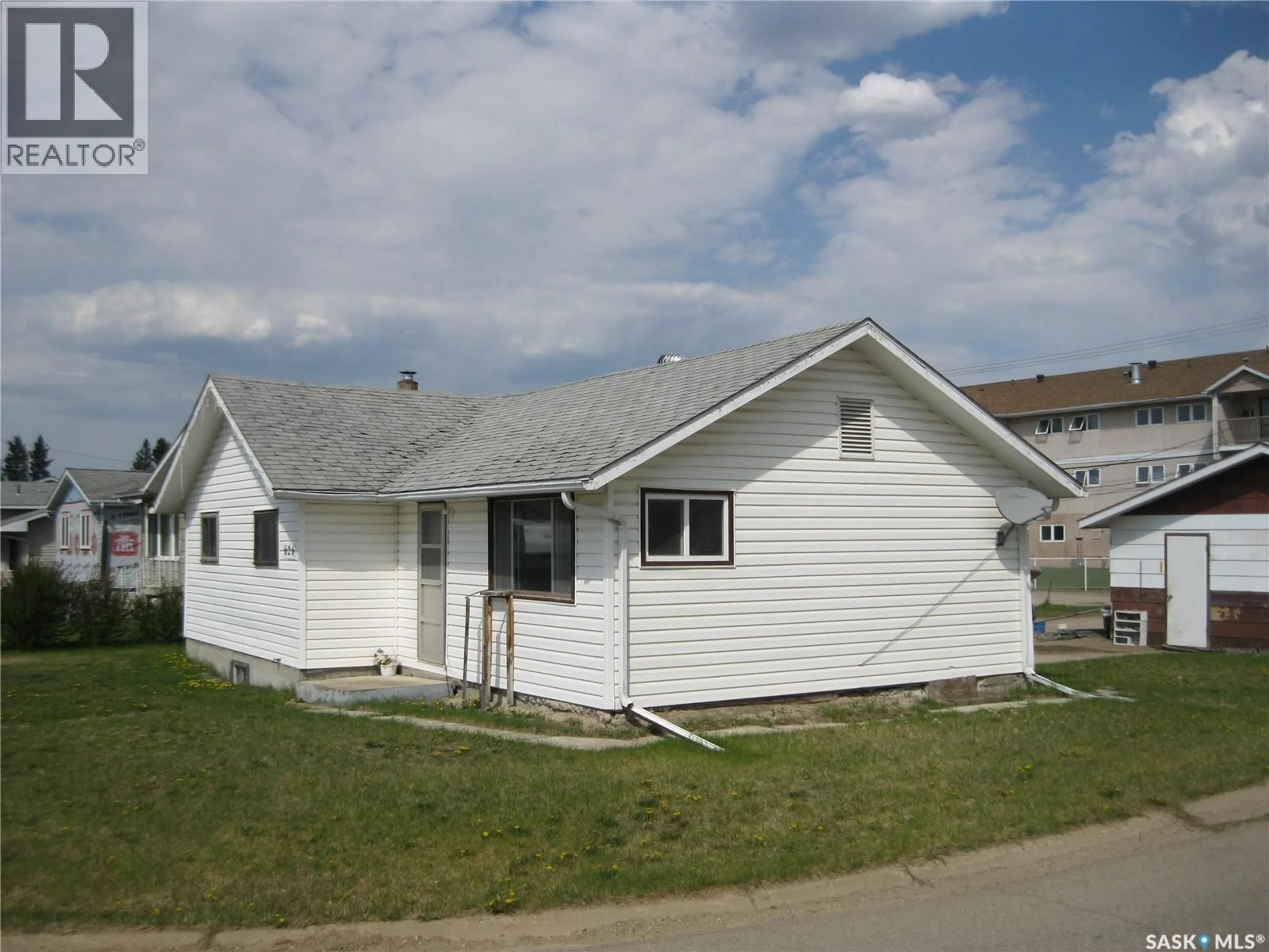 Home with vinyl exterior material, street for 626 MAIN STREET, Hudson Bay Saskatchewan S0E0Y0