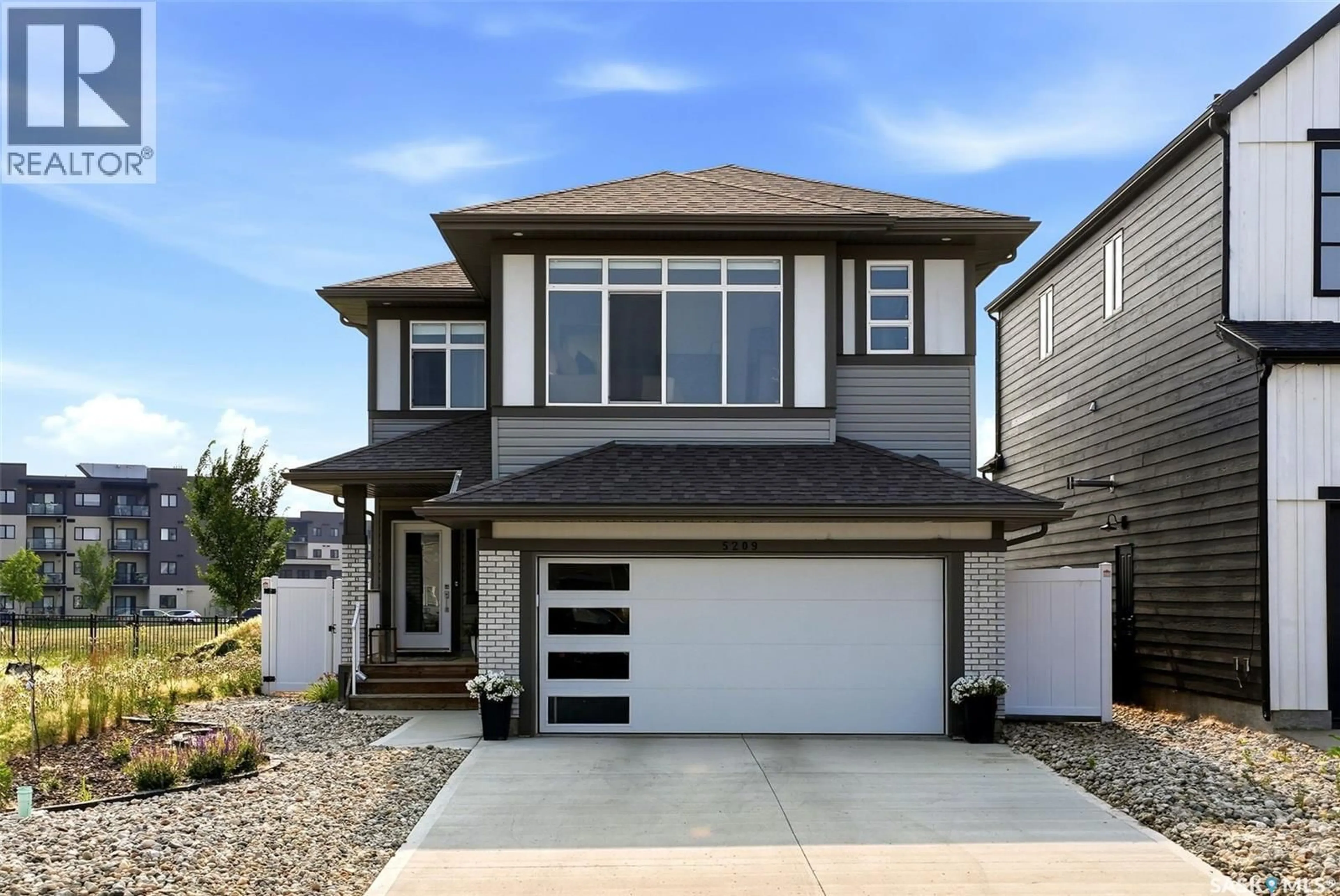 Home with vinyl exterior material, street for 5209 GREEN CRESCENT, Regina Saskatchewan S4V3S9