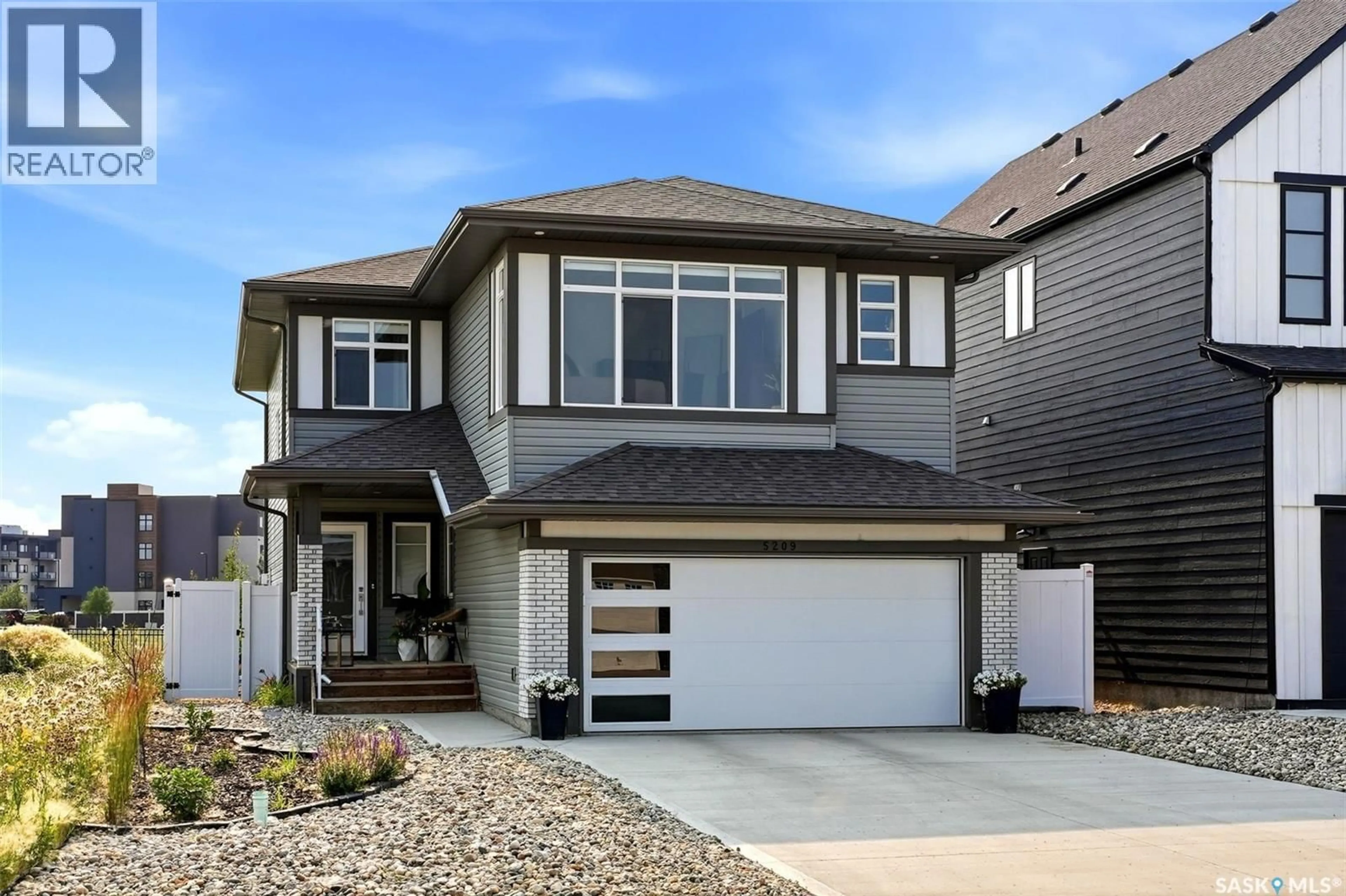 Home with vinyl exterior material, street for 5209 GREEN CRESCENT, Regina Saskatchewan S4V3S9