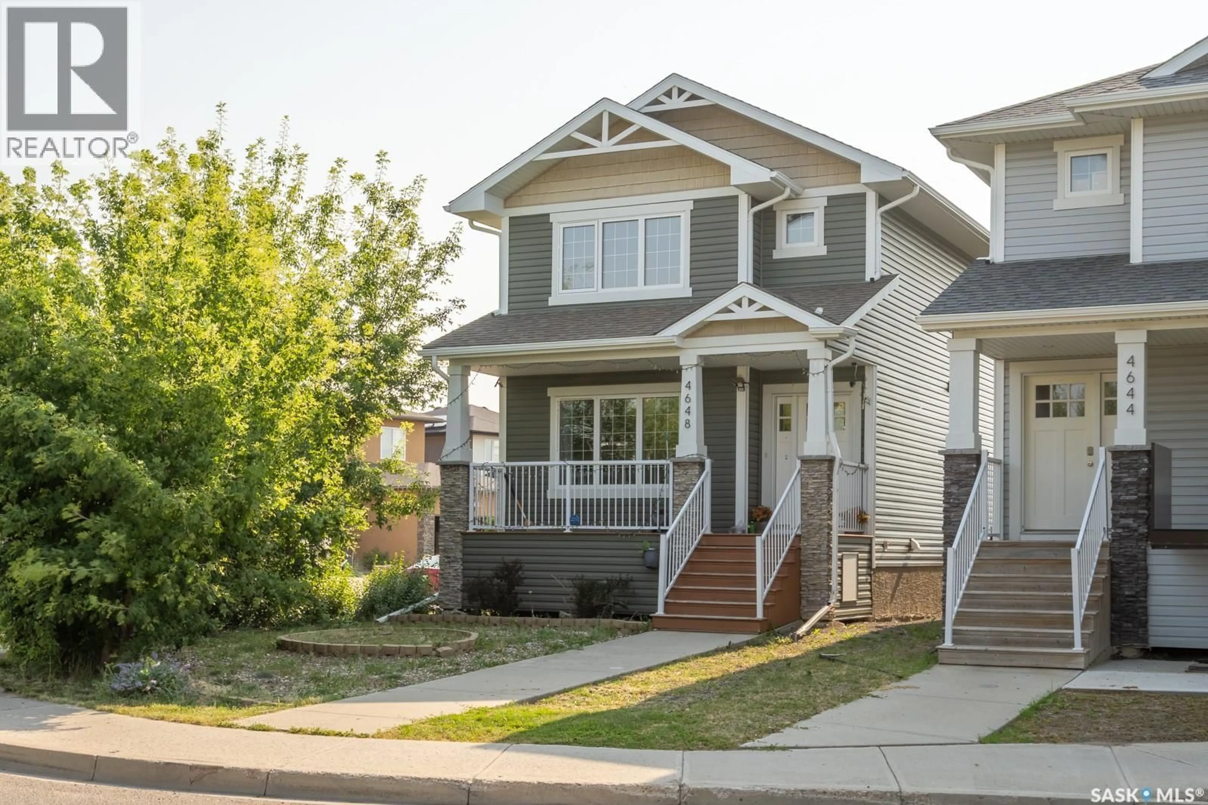 Home with vinyl exterior material, street for 4648 JAMES HILL ROAD, Regina Saskatchewan S4W0C7