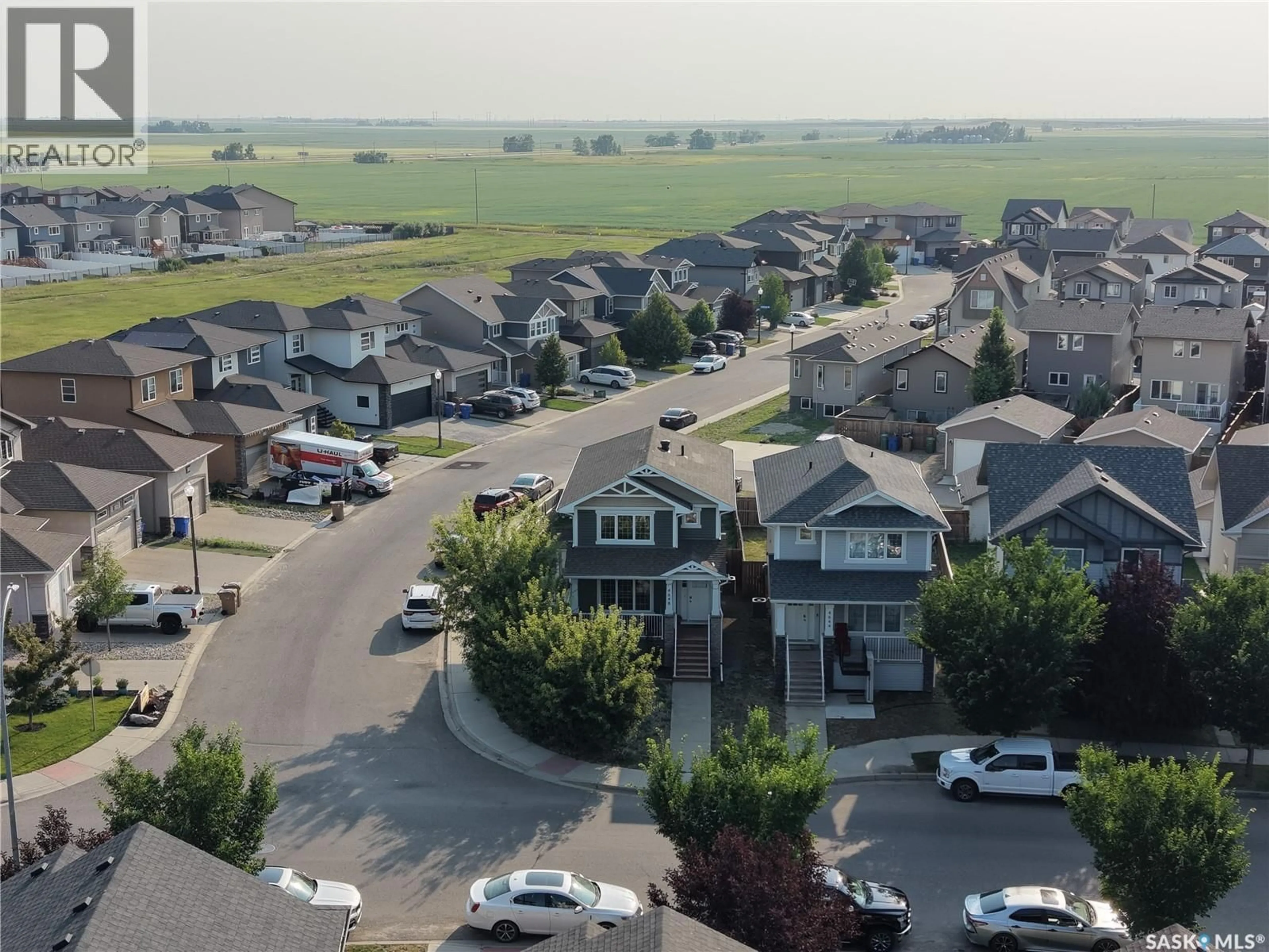 A pic from outside/outdoor area/front of a property/back of a property/a pic from drone, unknown for 4648 JAMES HILL ROAD, Regina Saskatchewan S4W0C7