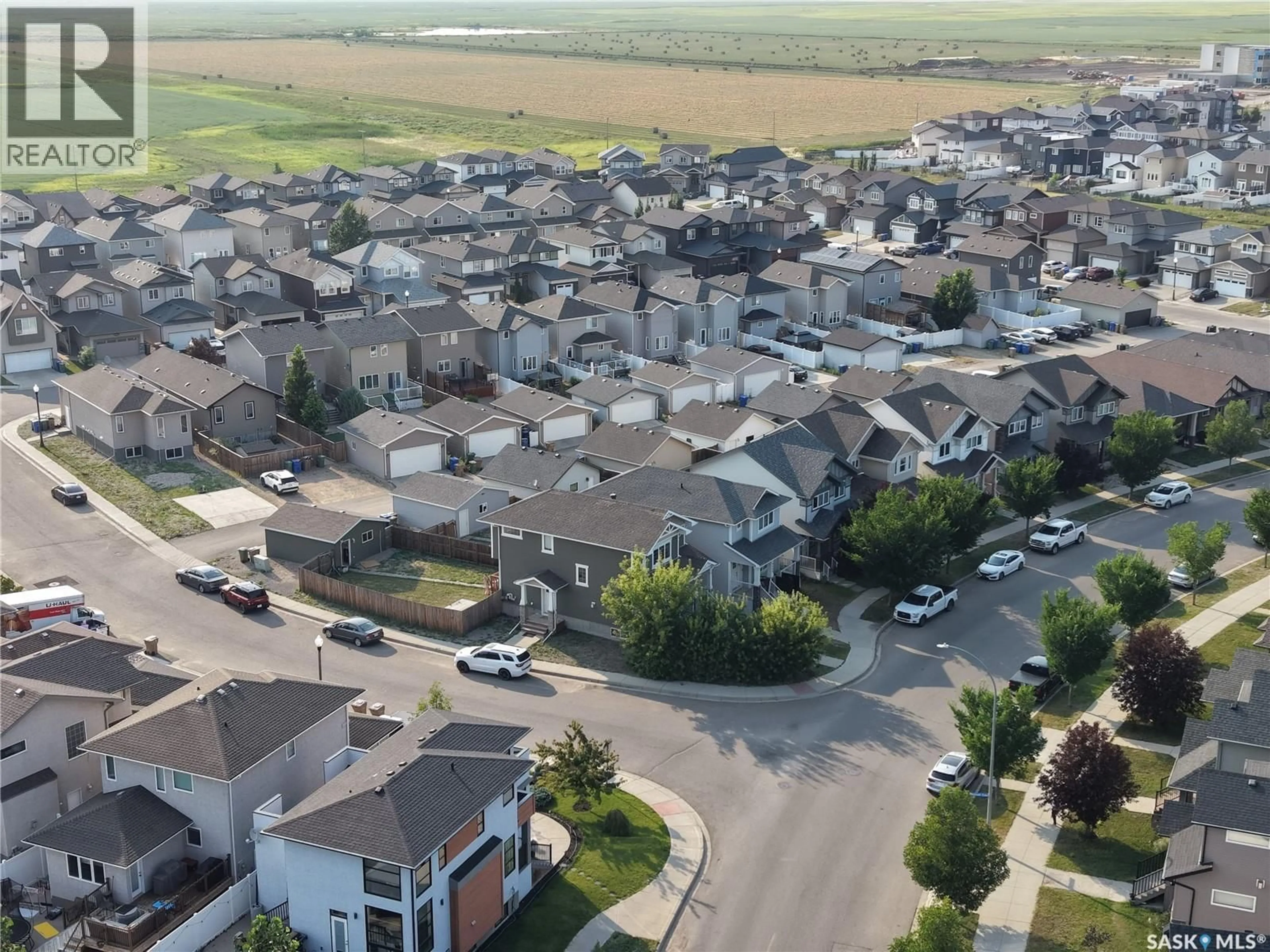 A pic from outside/outdoor area/front of a property/back of a property/a pic from drone, street for 4648 JAMES HILL ROAD, Regina Saskatchewan S4W0C7