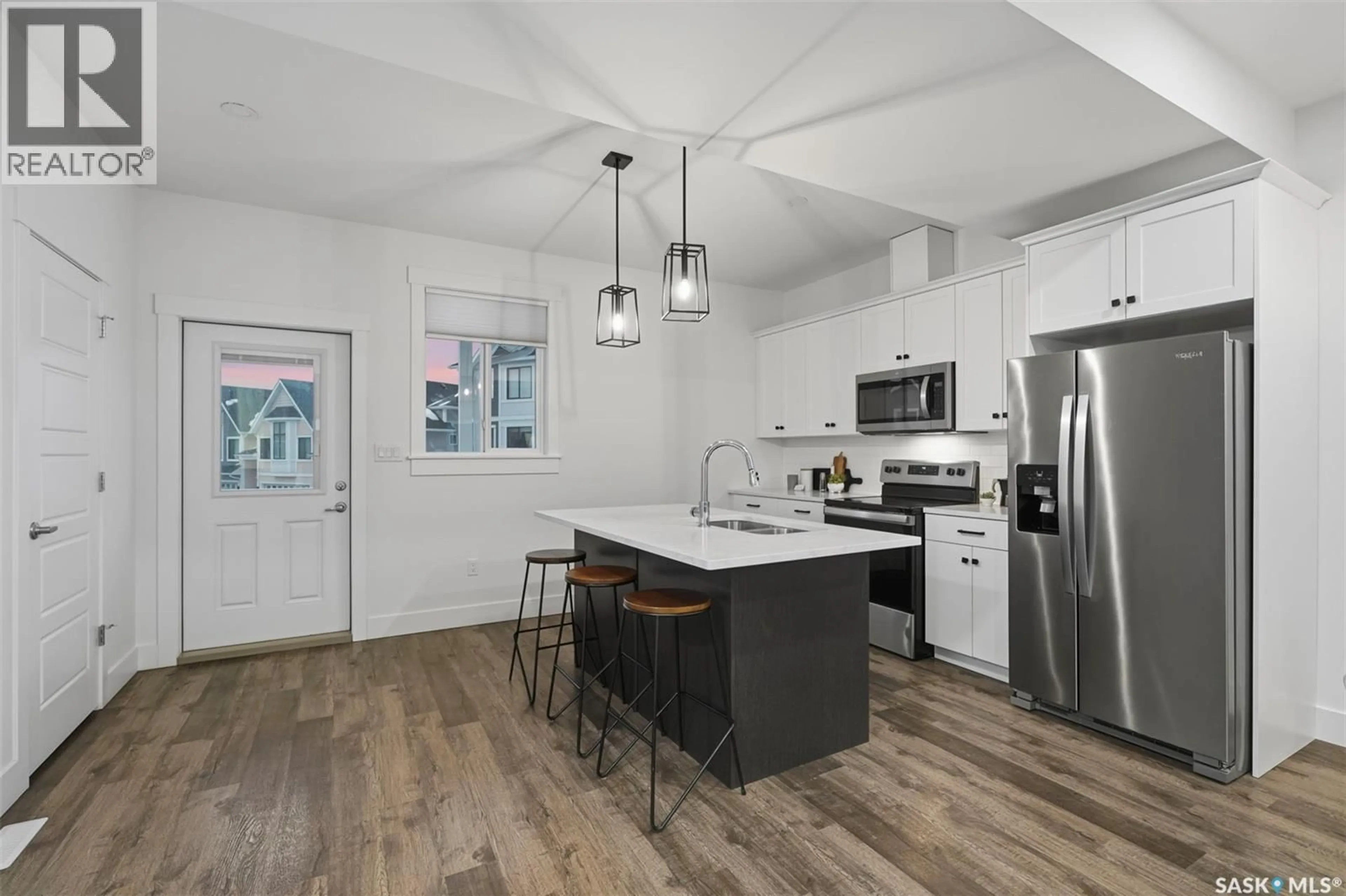 Open concept kitchen, unknown for 39 900 ST ANDREWS LANE, Warman Saskatchewan S0K4S4