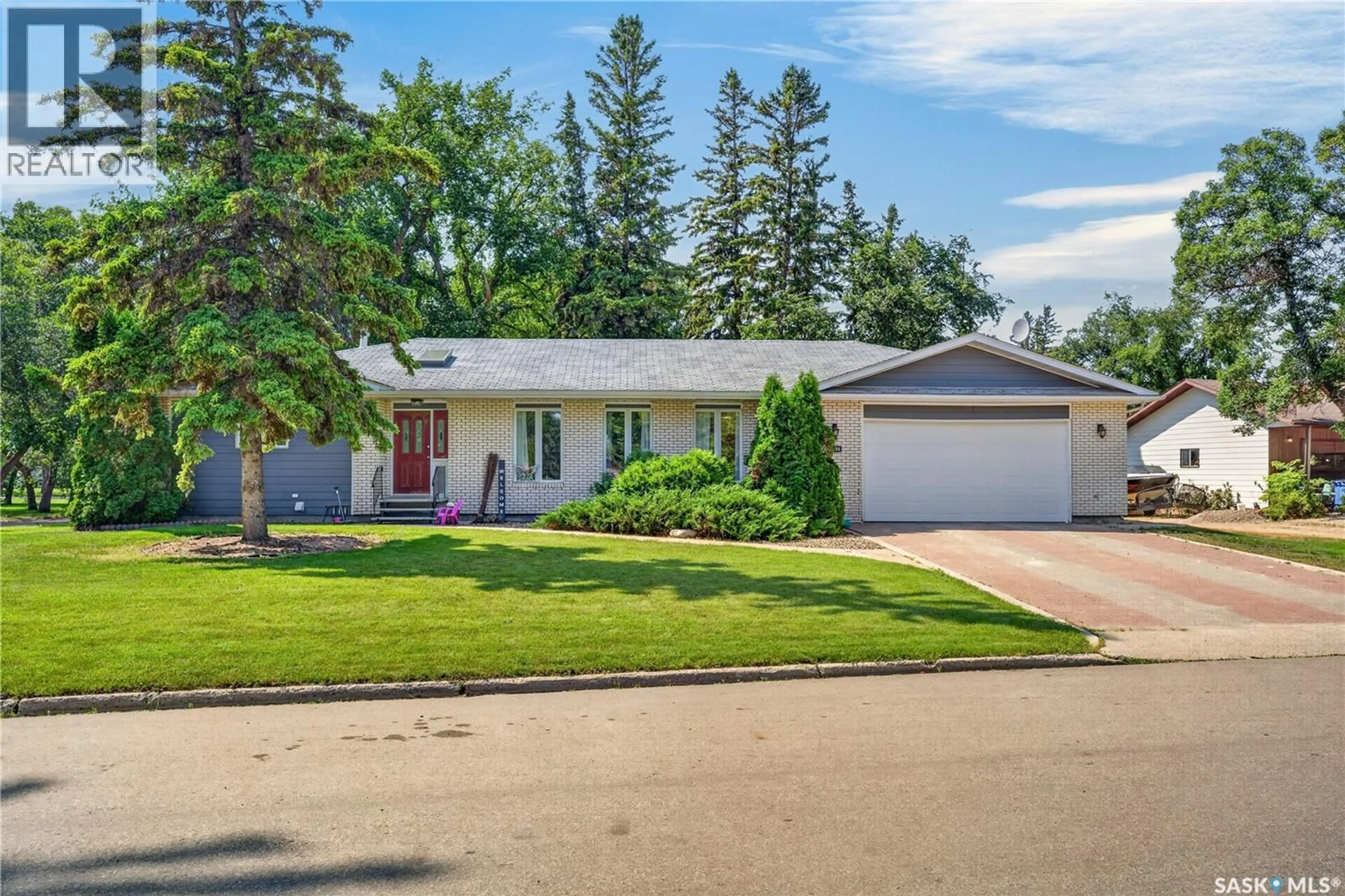 Home with vinyl exterior material, street for 1601 100A STREET, Tisdale Saskatchewan S0E1T0