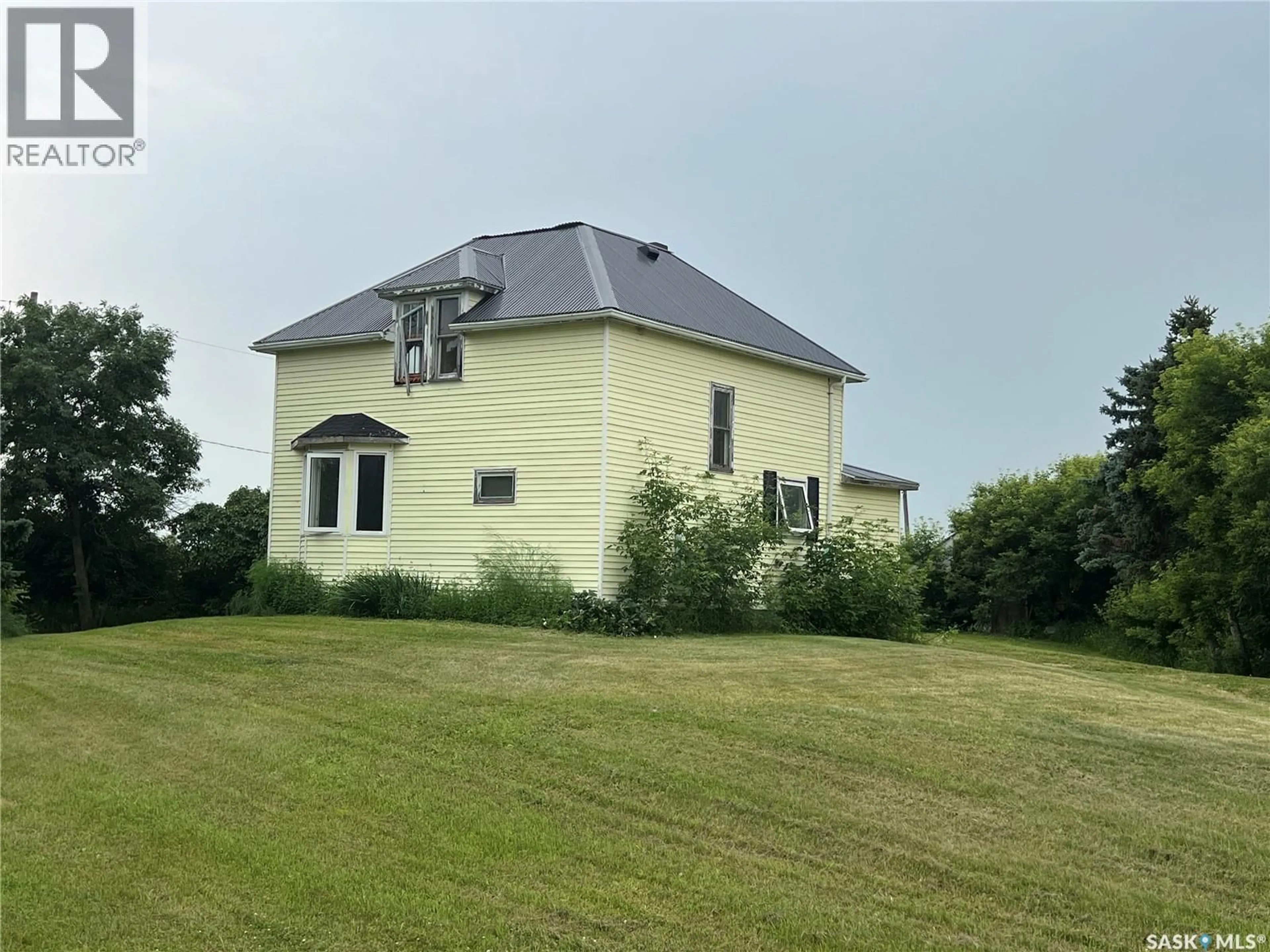 A pic from outside/outdoor area/front of a property/back of a property/a pic from drone, building for BOMBERAK ACREAGE, Fertile Belt Rm No. 183 Saskatchewan S0A3Y0