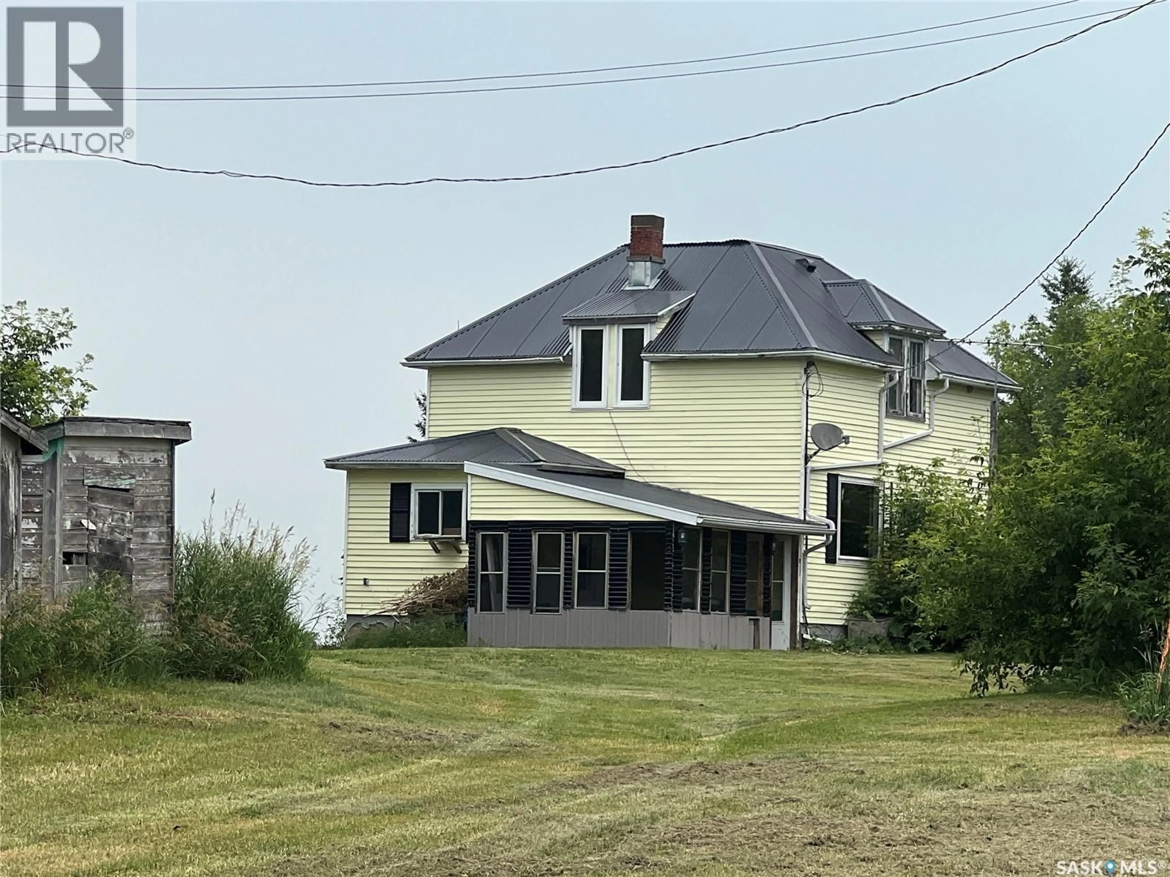 A pic from outside/outdoor area/front of a property/back of a property/a pic from drone, building for BOMBERAK ACREAGE, Fertile Belt Rm No. 183 Saskatchewan S0A3Y0