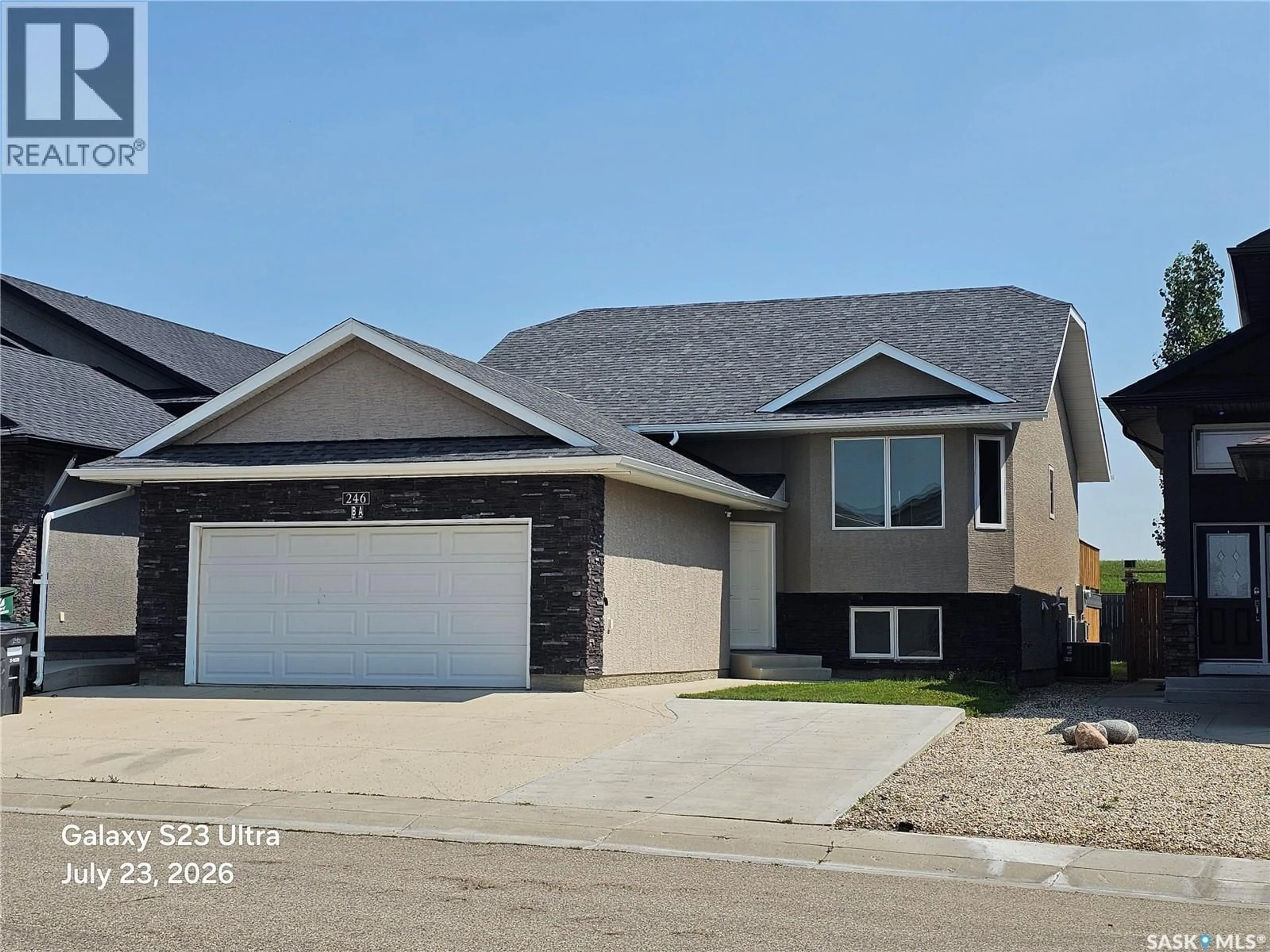 Home with vinyl exterior material, street for 246 SUTTER PLACE, Saskatoon Saskatchewan S7T0R3