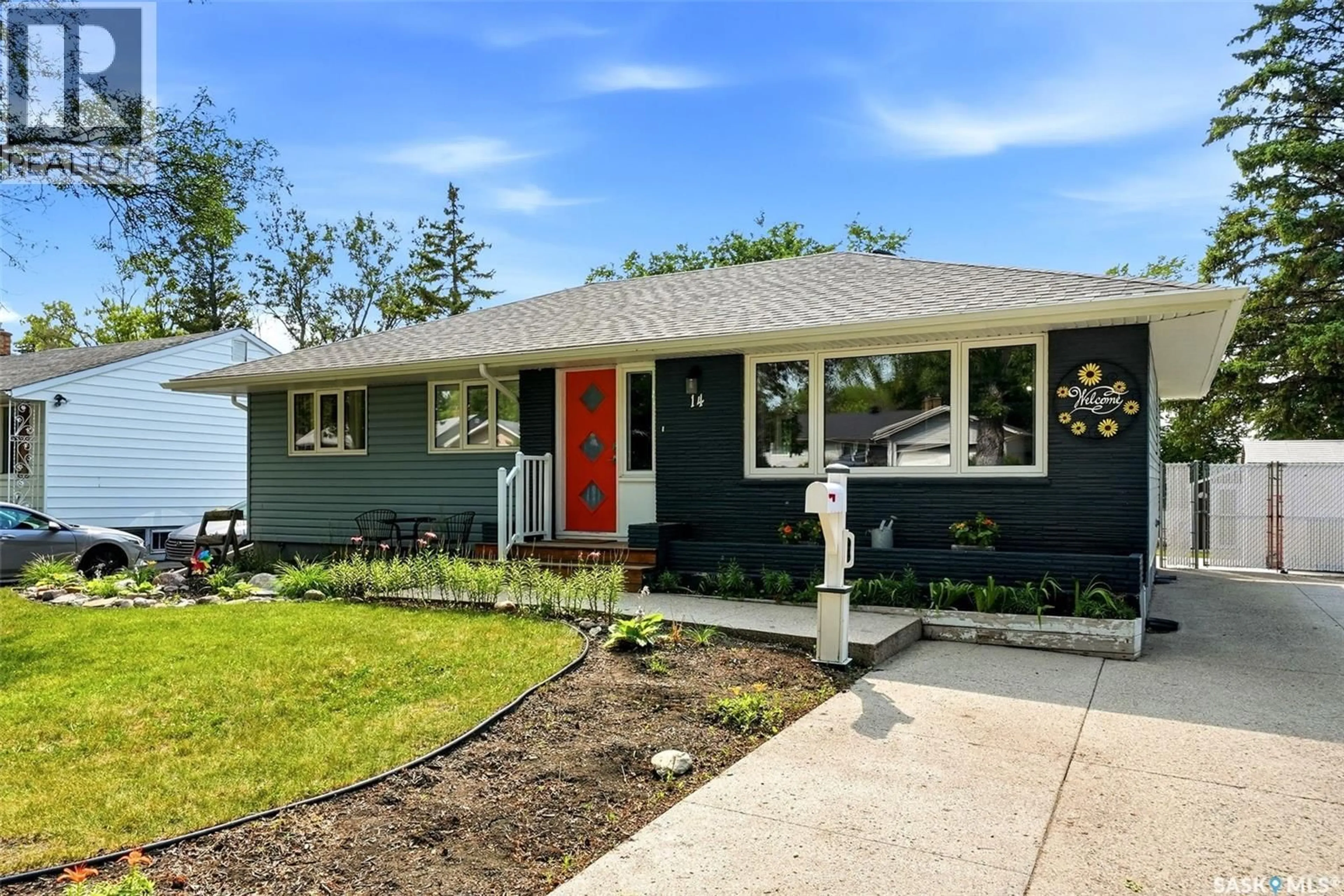 Home with vinyl exterior material, street for 14 BELL STREET, Regina Saskatchewan S4S4B6