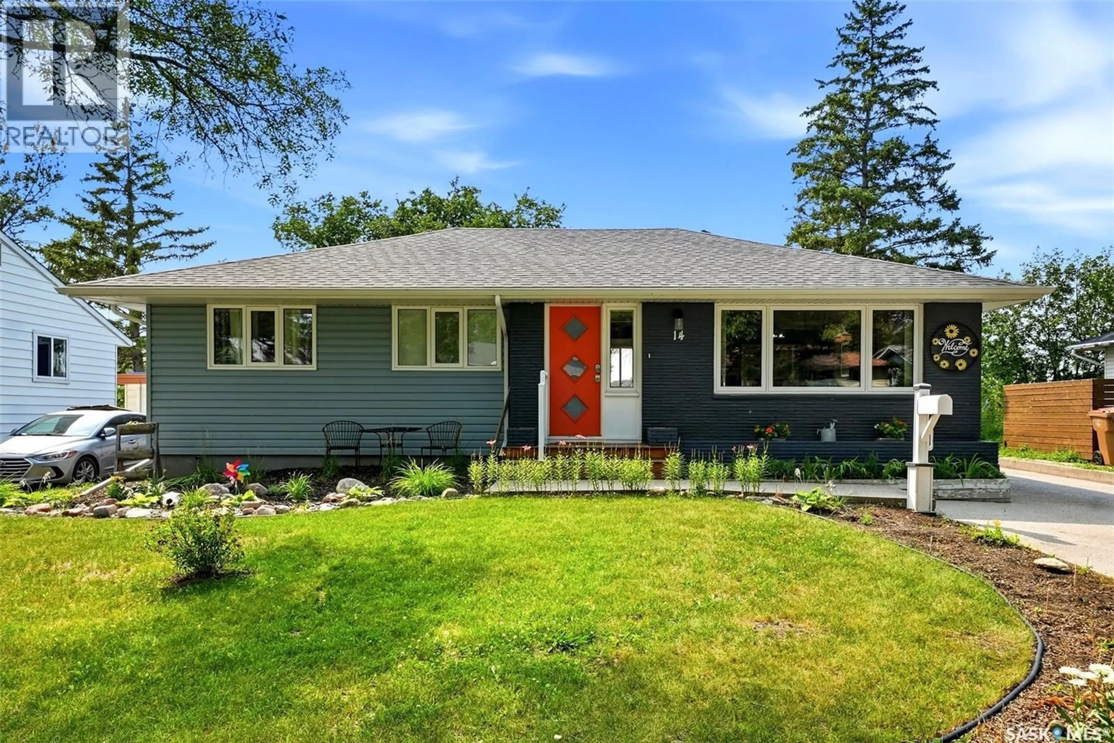 Home with vinyl exterior material, street for 14 BELL STREET, Regina Saskatchewan S4S4B6