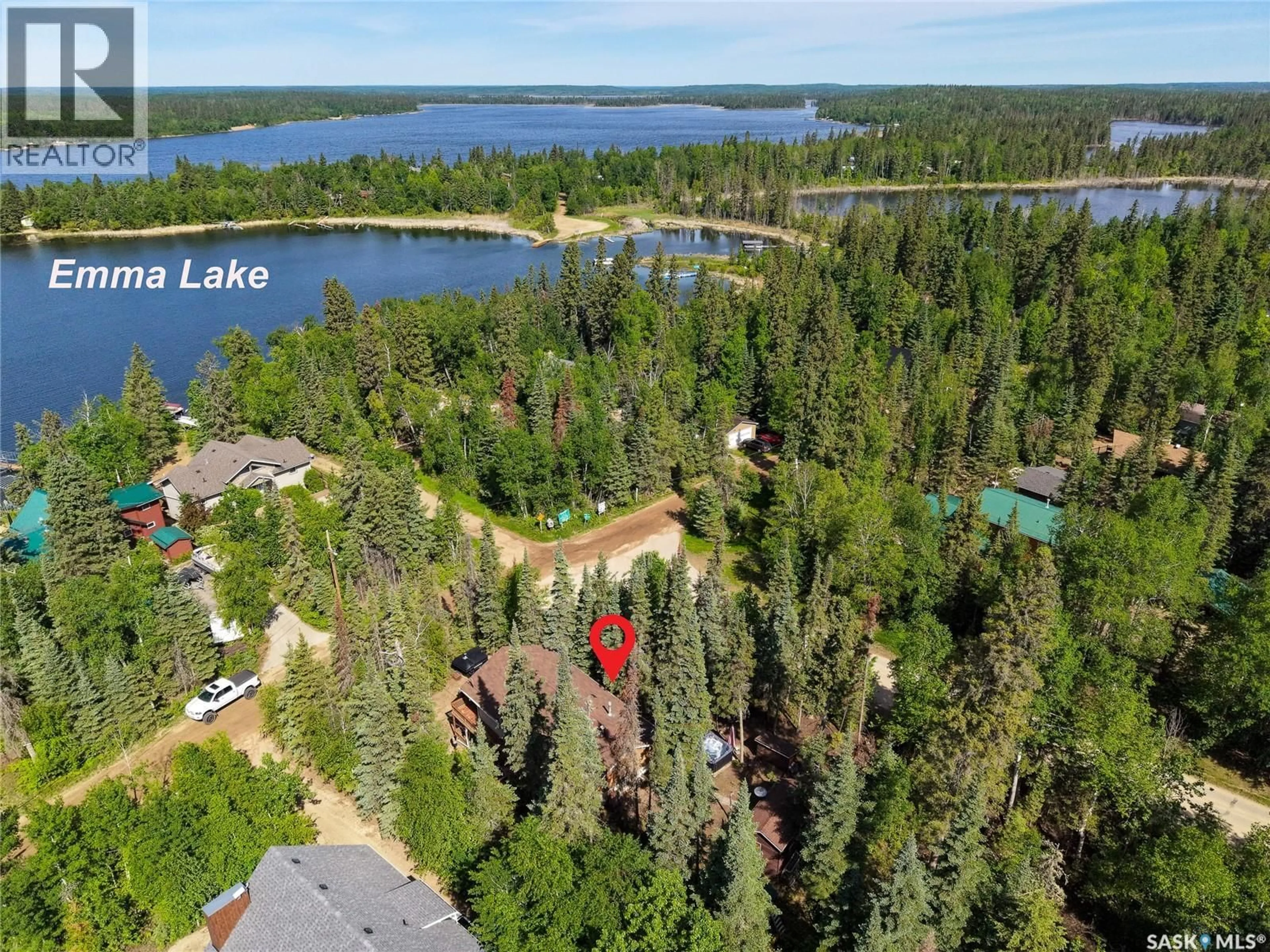 A pic from outside/outdoor area/front of a property/back of a property/a pic from drone, water/lake/river/ocean view for 619 MARINE DRIVE, Emma Lake Saskatchewan S0J0N0
