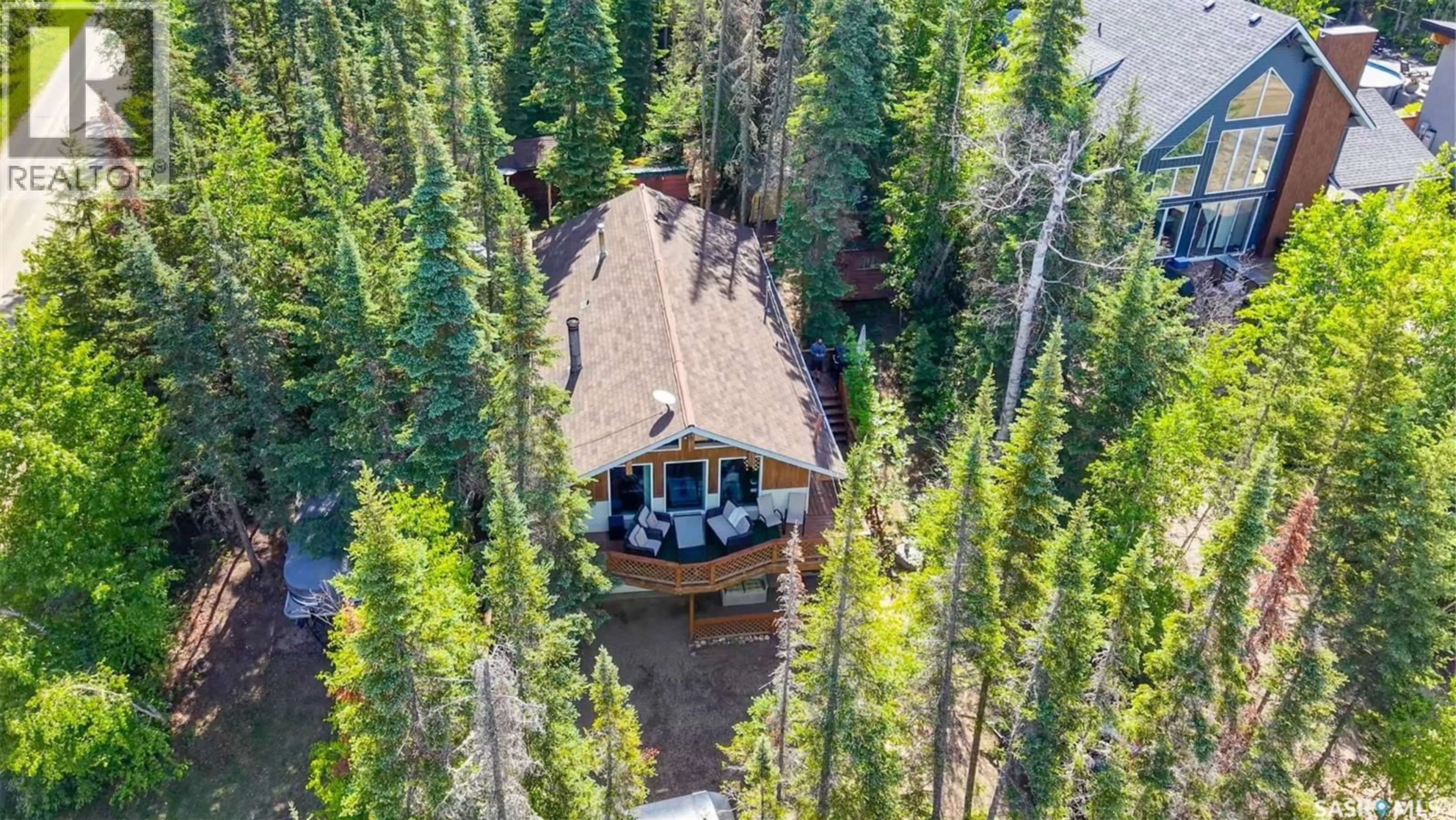 A pic from outside/outdoor area/front of a property/back of a property/a pic from drone, forest/trees view for 619 MARINE DRIVE, Emma Lake Saskatchewan S0J0N0