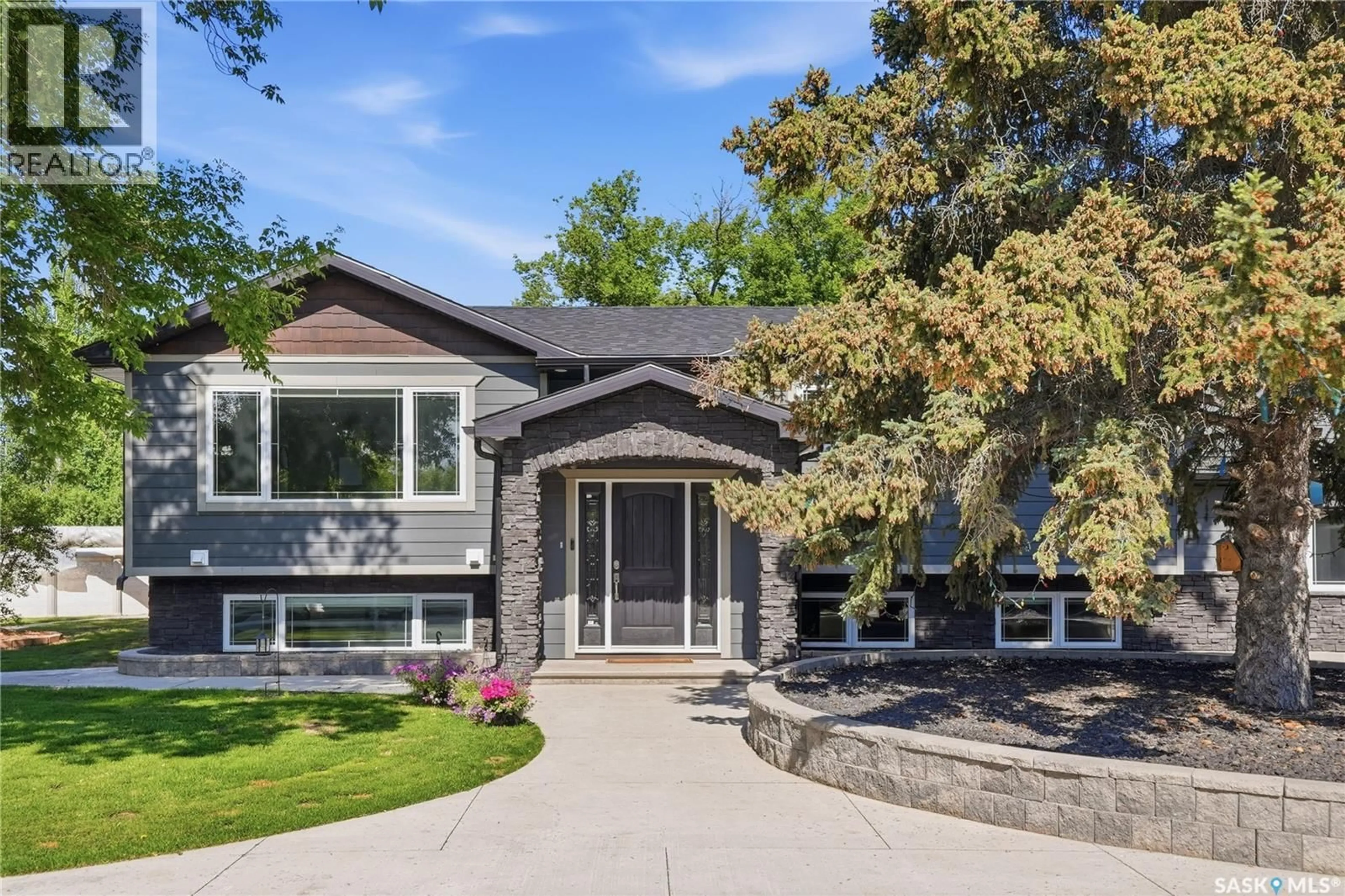 Home with brick exterior material, street for 701 MAIN STREET, Hague Saskatchewan S0K1X0