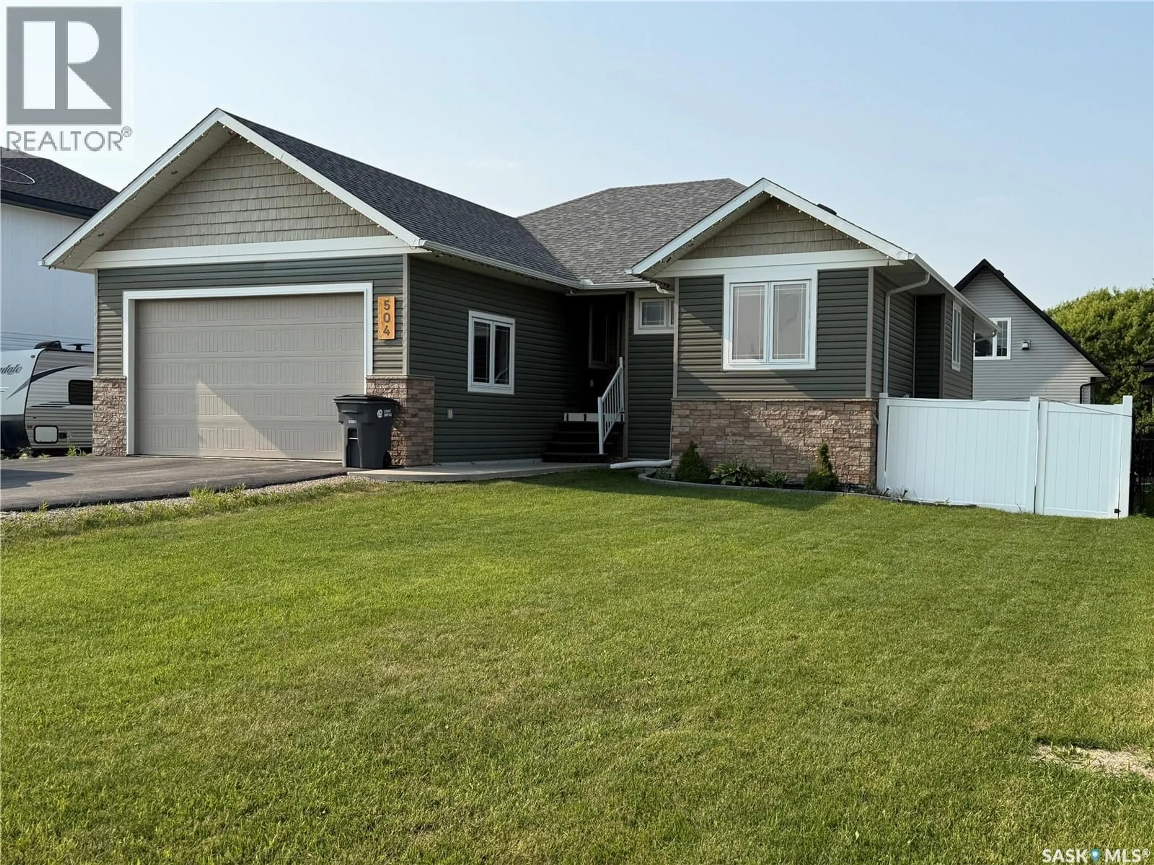 Home with vinyl exterior material, street for 504 WRIGHT ROAD, Moosomin Saskatchewan S0G3N0