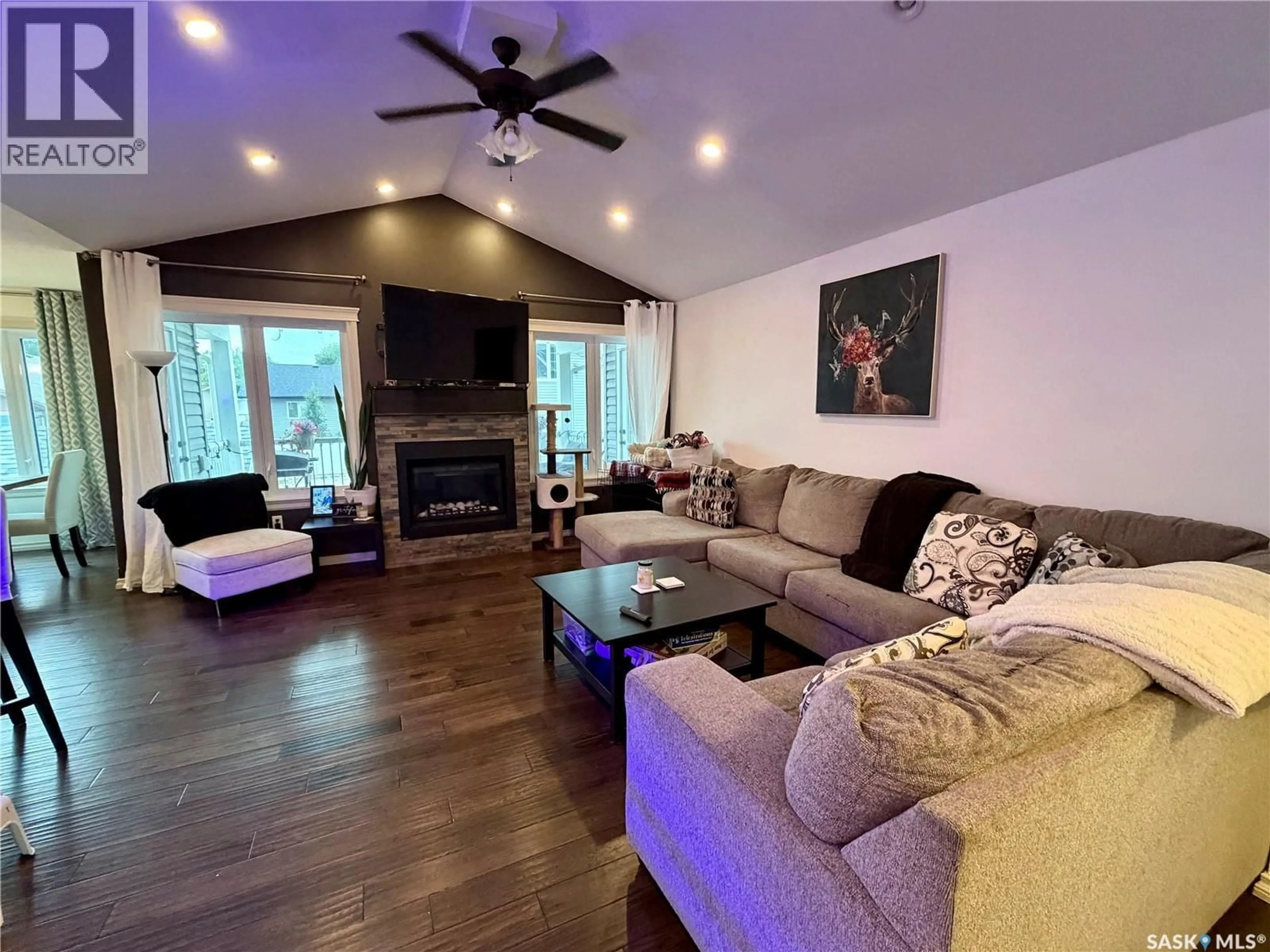 Living room with furniture, wood/laminate floor for 504 WRIGHT ROAD, Moosomin Saskatchewan S0G3N0