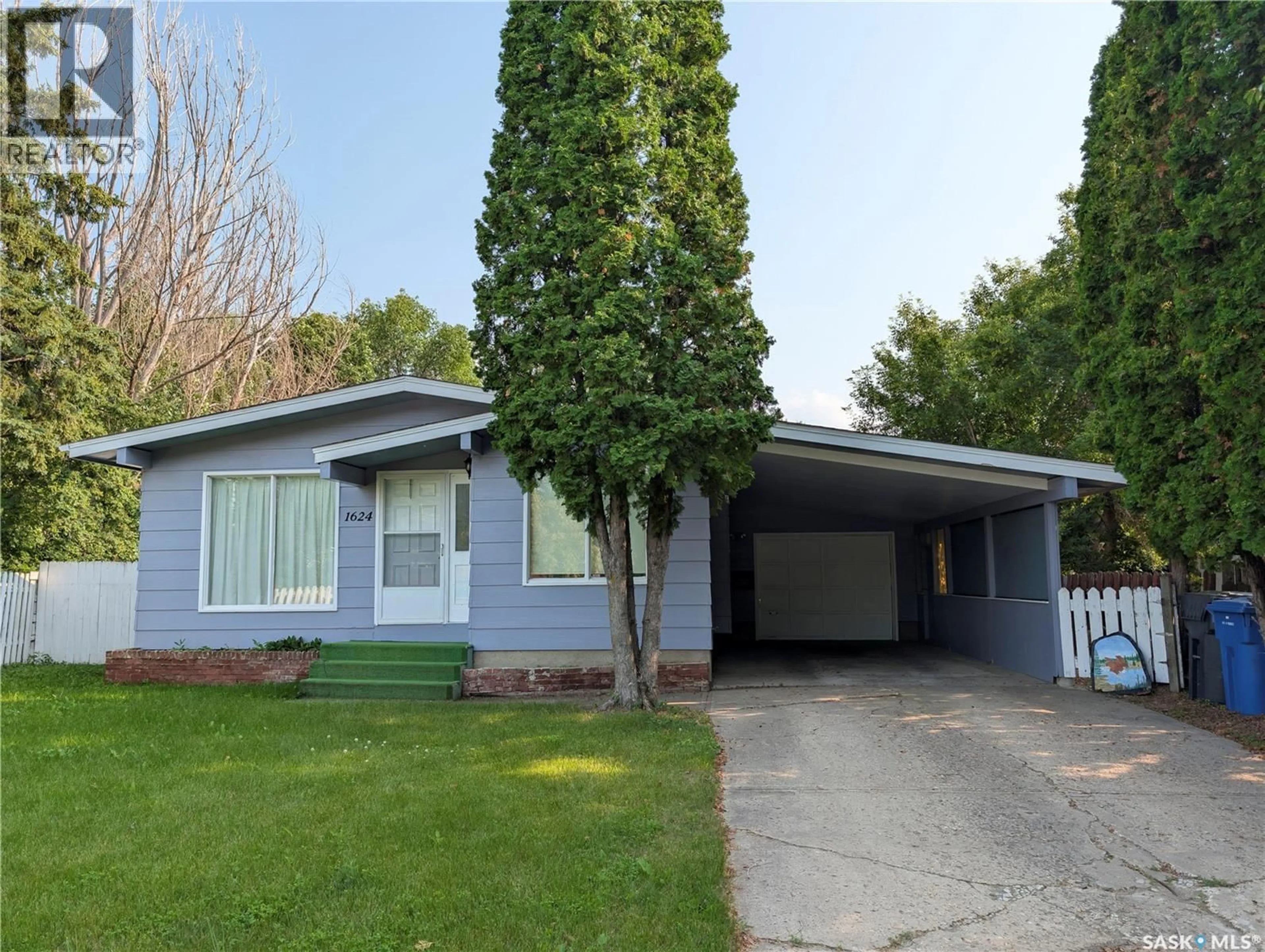 Home with vinyl exterior material, street for 1624 ST LAURENT DRIVE, North Battleford Saskatchewan S9A3B3