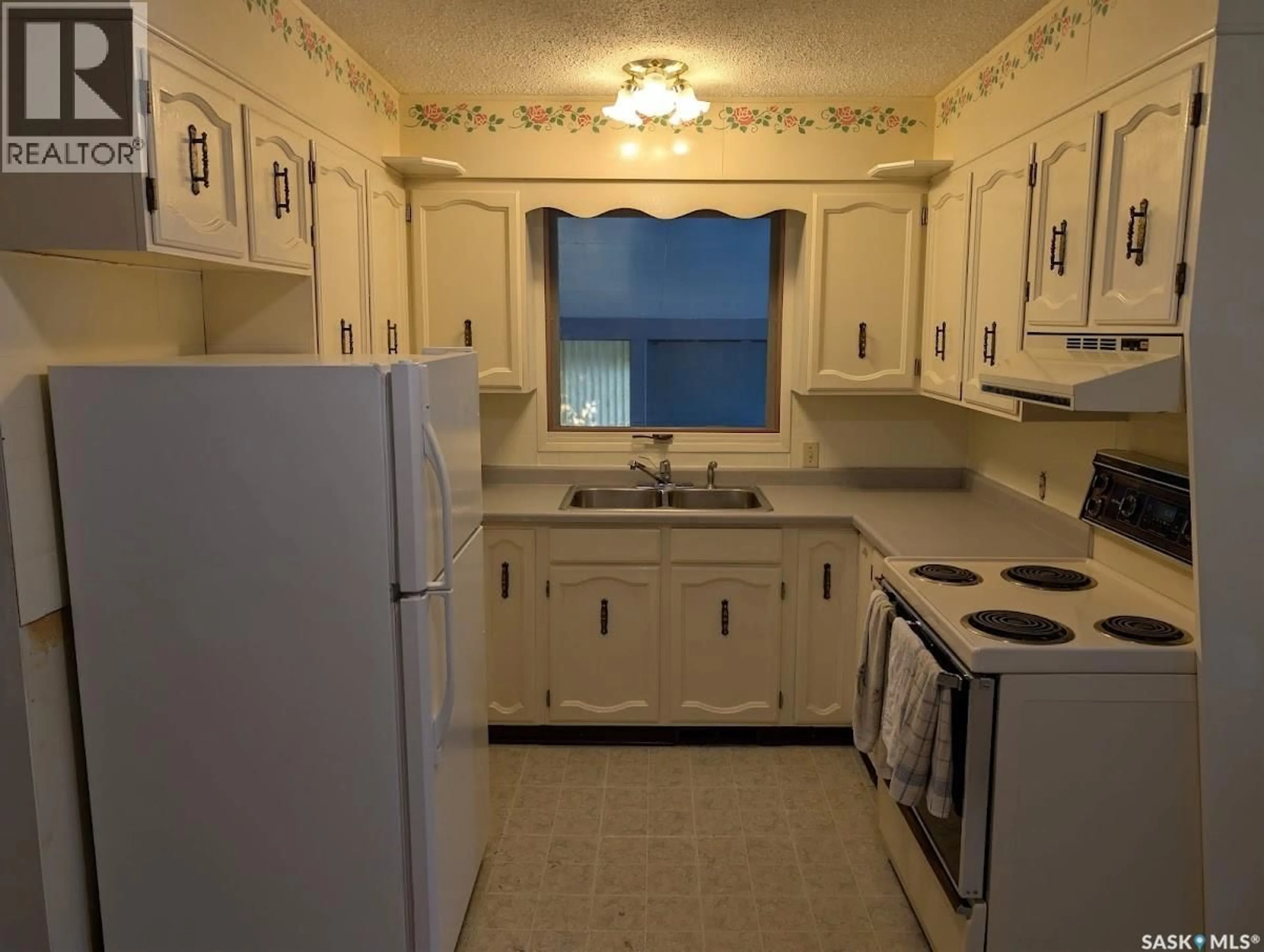 Standard kitchen, ceramic/tile floor for 1624 ST LAURENT DRIVE, North Battleford Saskatchewan S9A3B3
