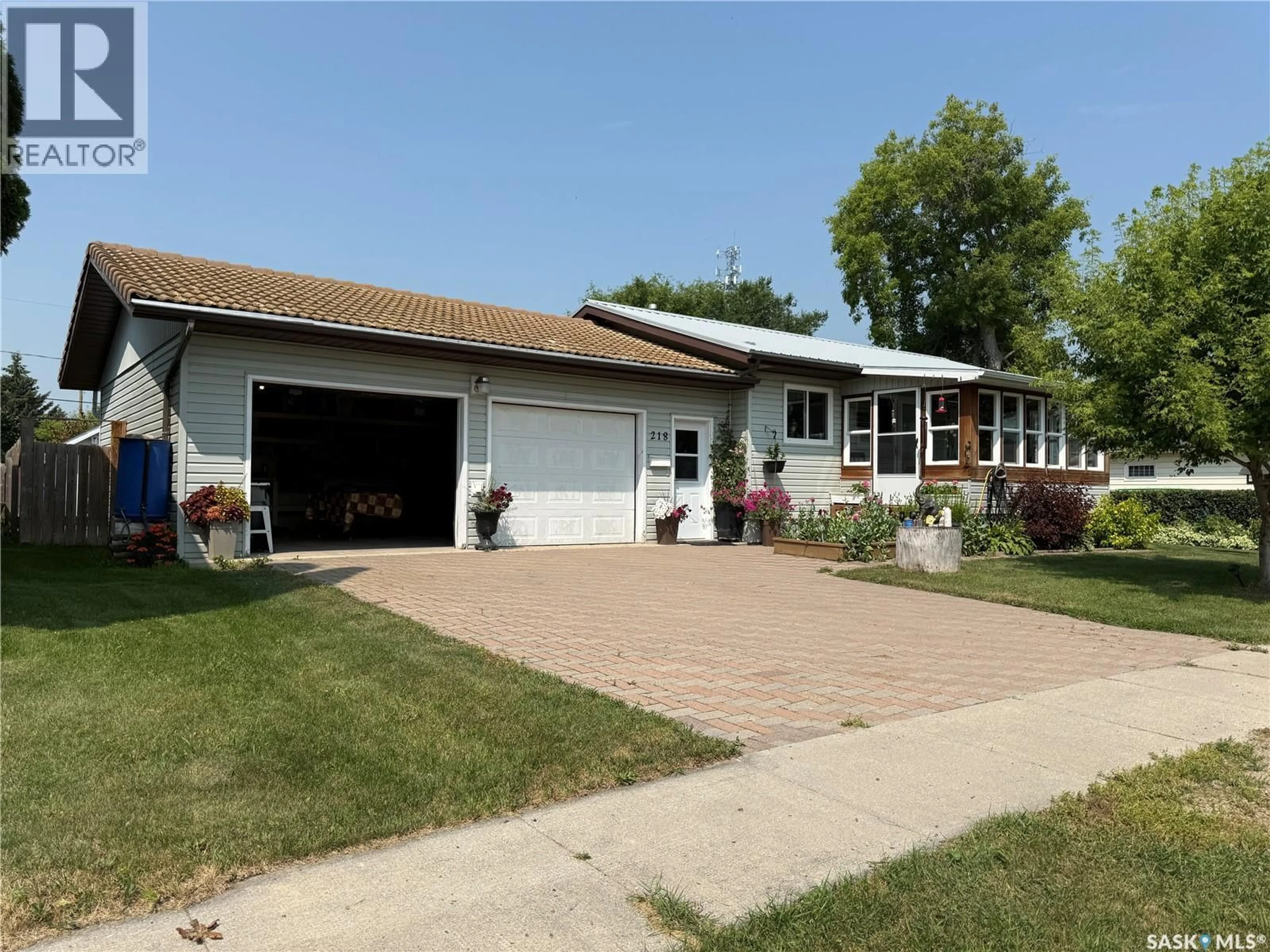 Home with vinyl exterior material, street for 218 ROSE STREET, Lemberg Saskatchewan S0A2B0