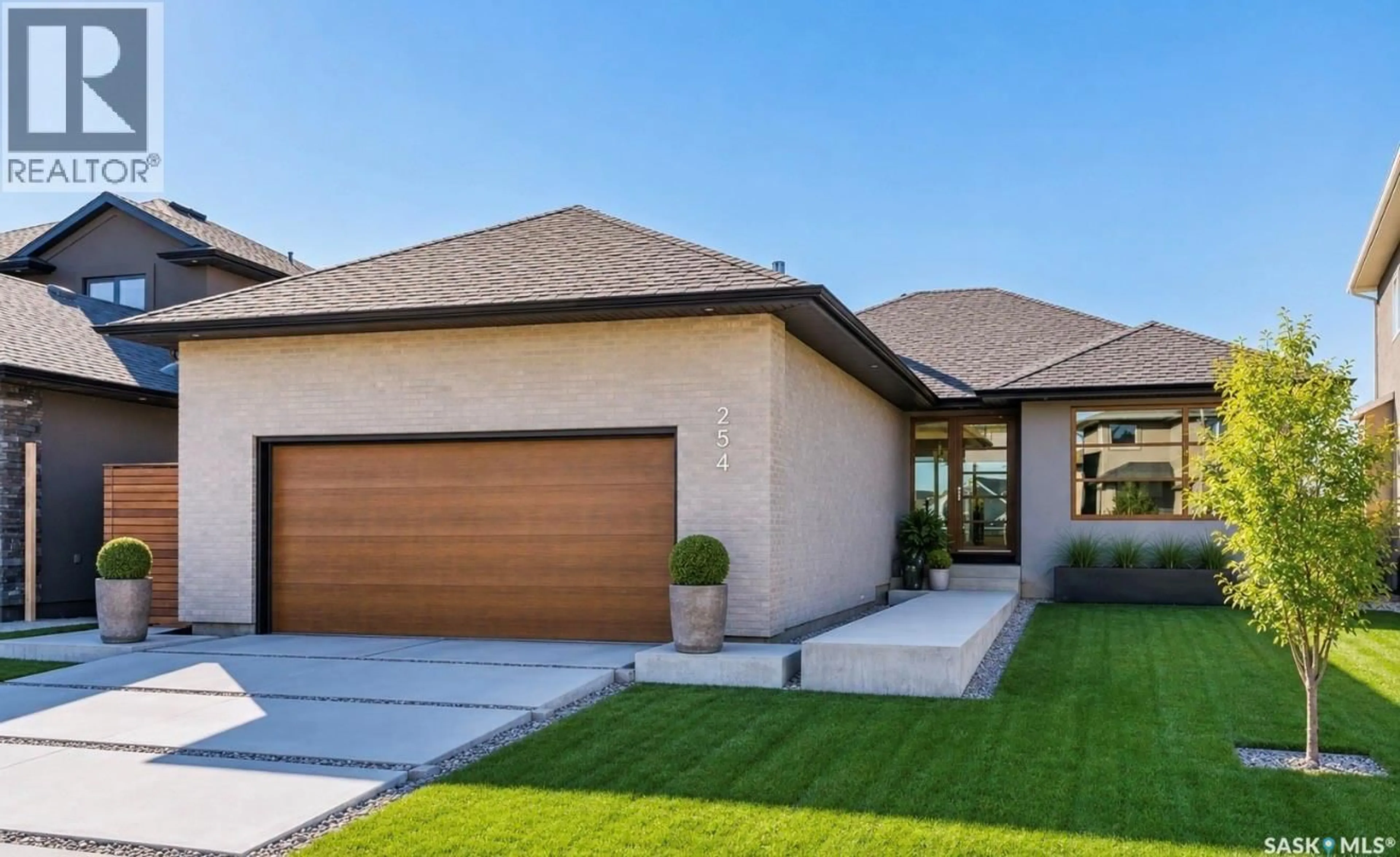 Home with brick exterior material, street for 254 WHALLEY CRESCENT, Saskatoon Saskatchewan S7T0P1