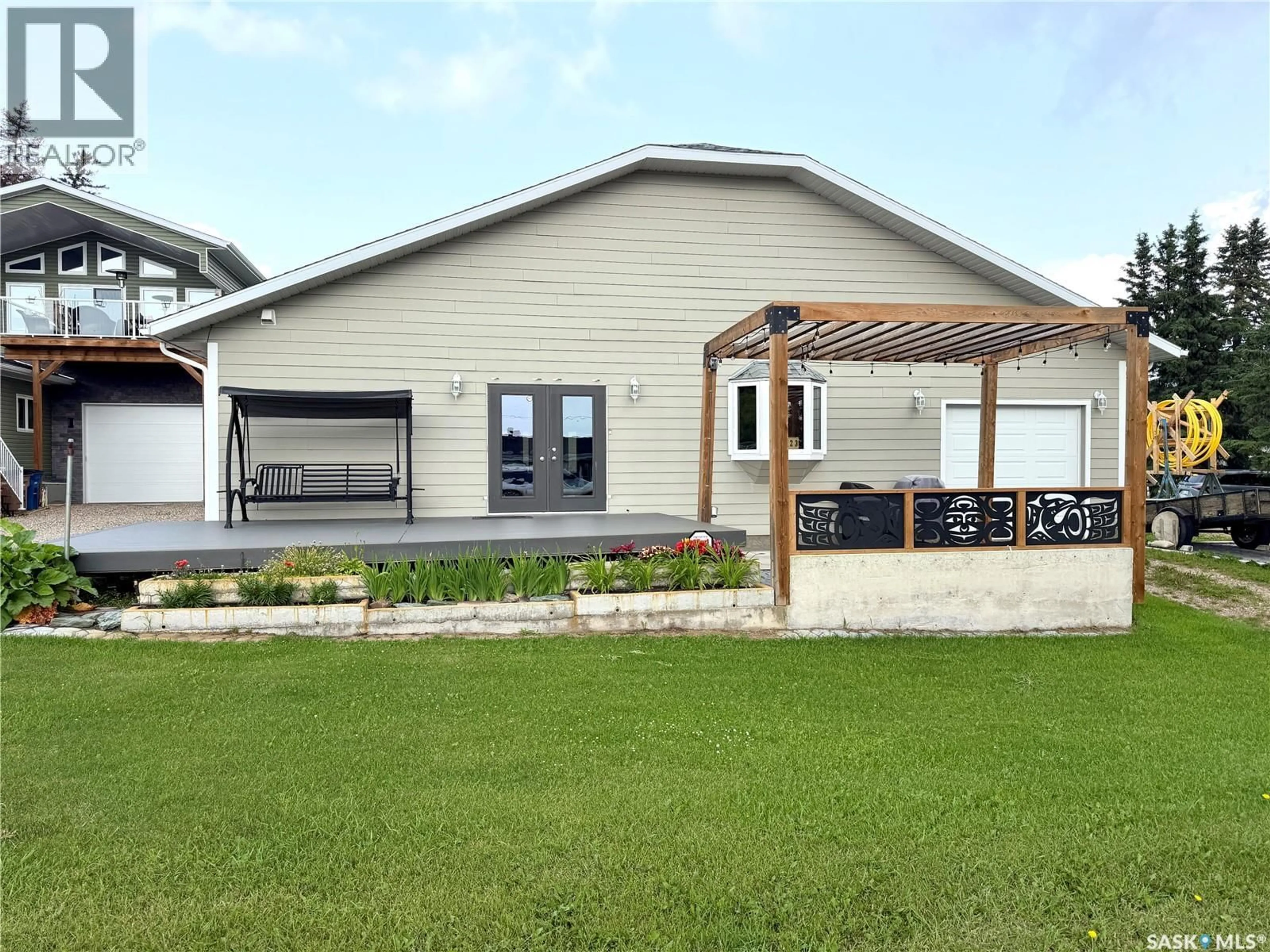 Home with vinyl exterior material, street for 123 CHITEK DRIVE, Chitek Lake Saskatchewan S0J0L0