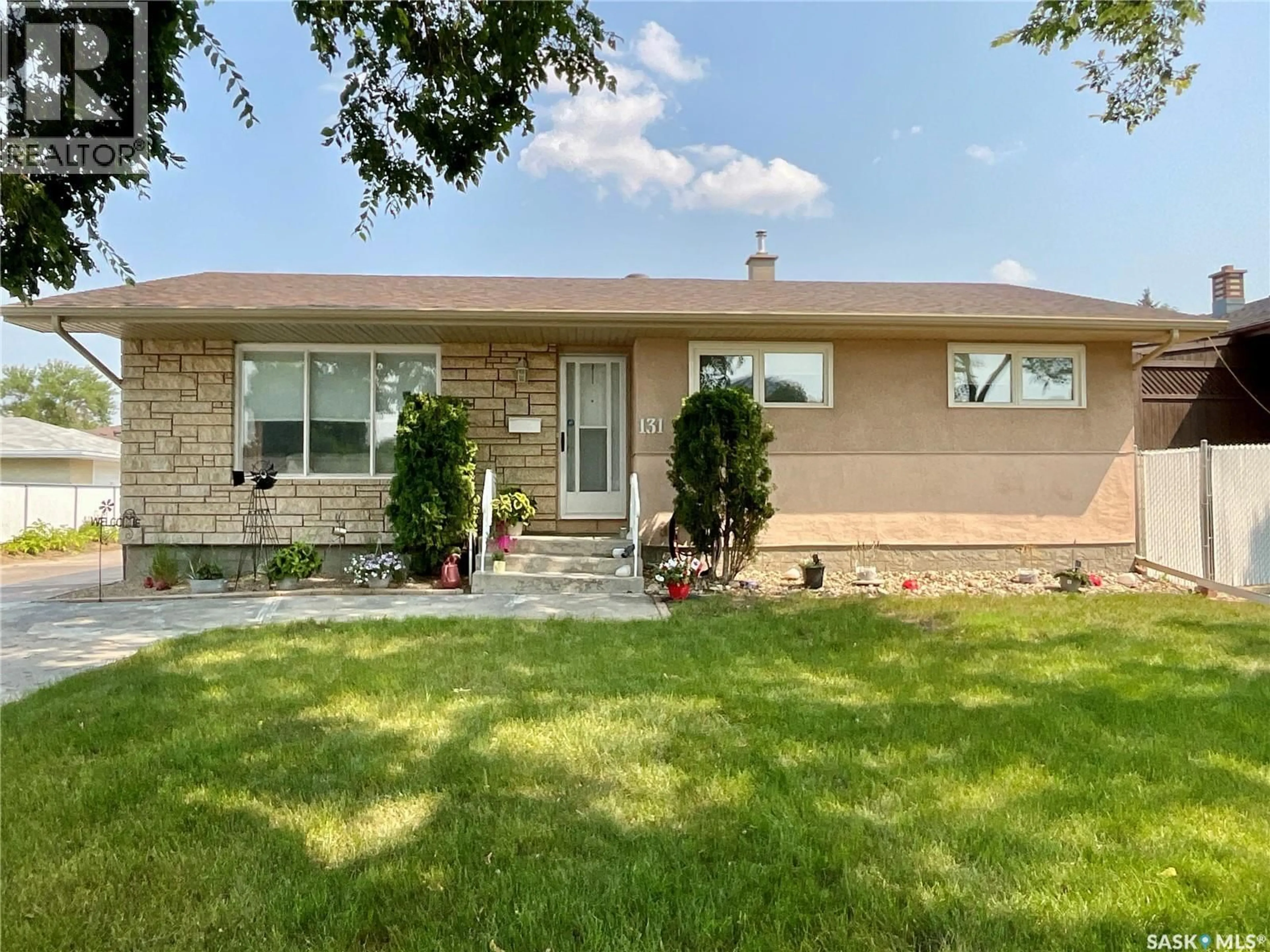 Home with vinyl exterior material, street for 131 WELLS STREET, Regina Saskatchewan S4R6J2