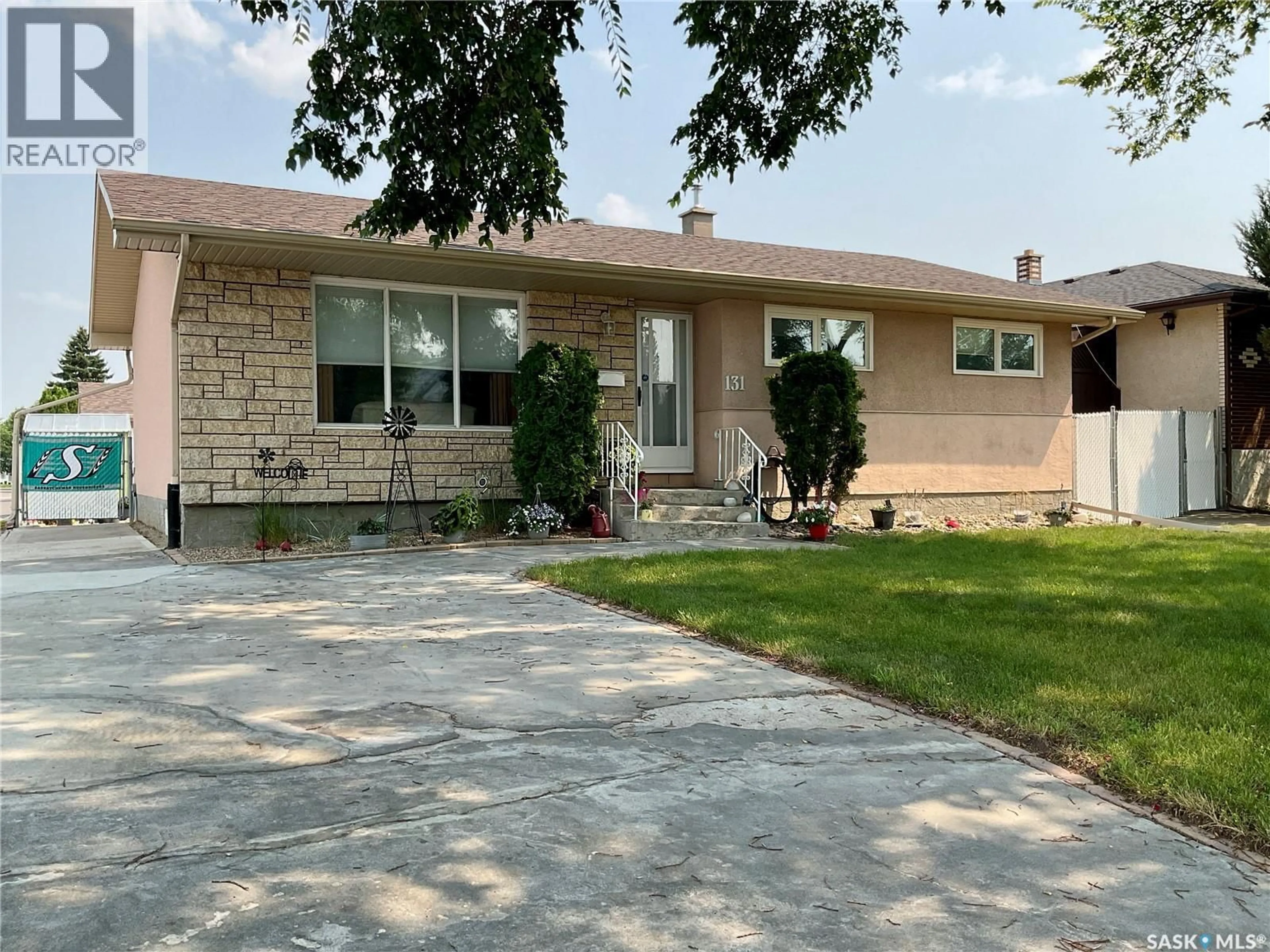 Home with vinyl exterior material, street for 131 WELLS STREET, Regina Saskatchewan S4R6J2