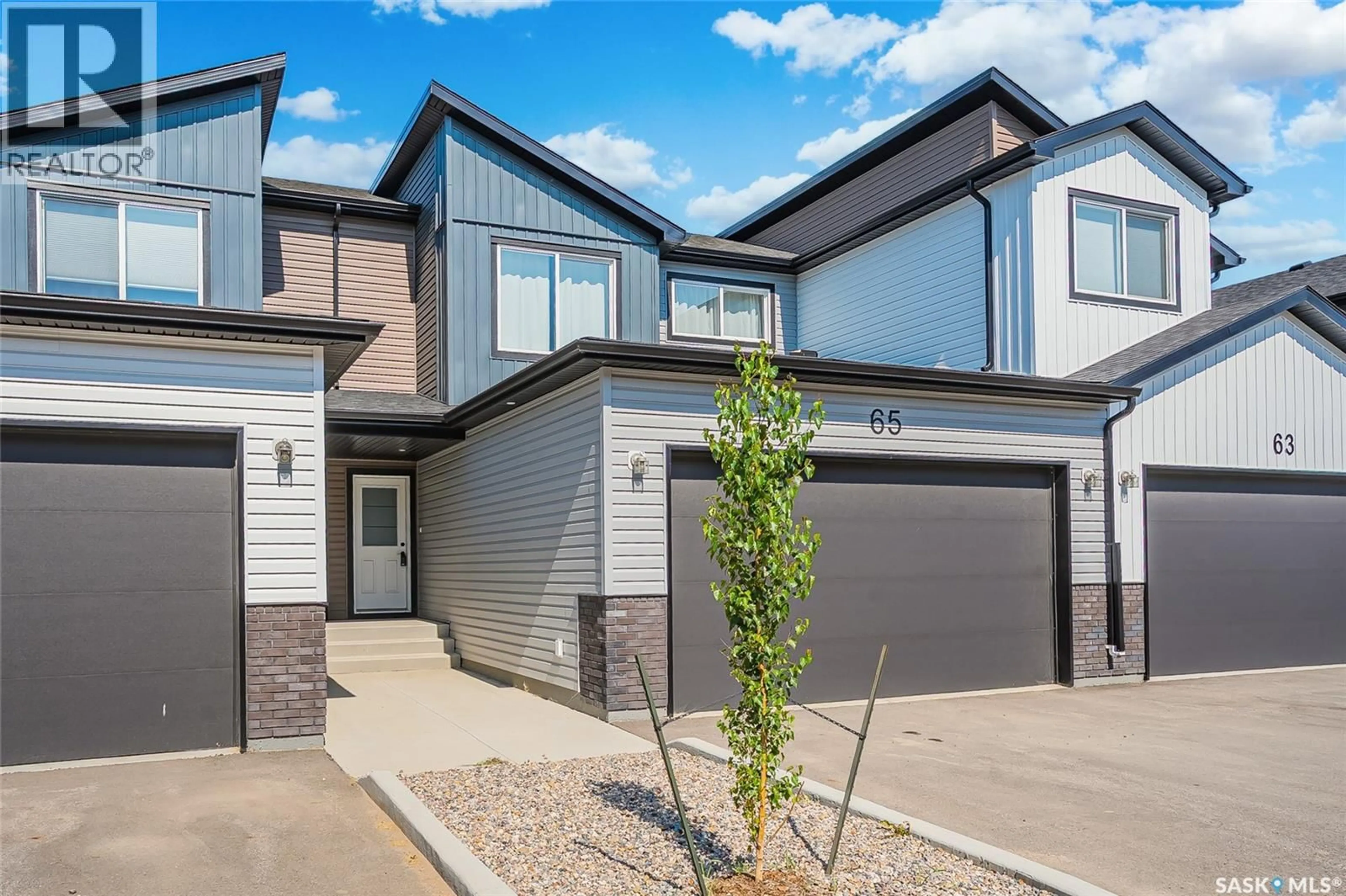Home with vinyl exterior material, street for 651 - 65 DUBOIS CRESCENT, Saskatoon Saskatchewan S7V1N3