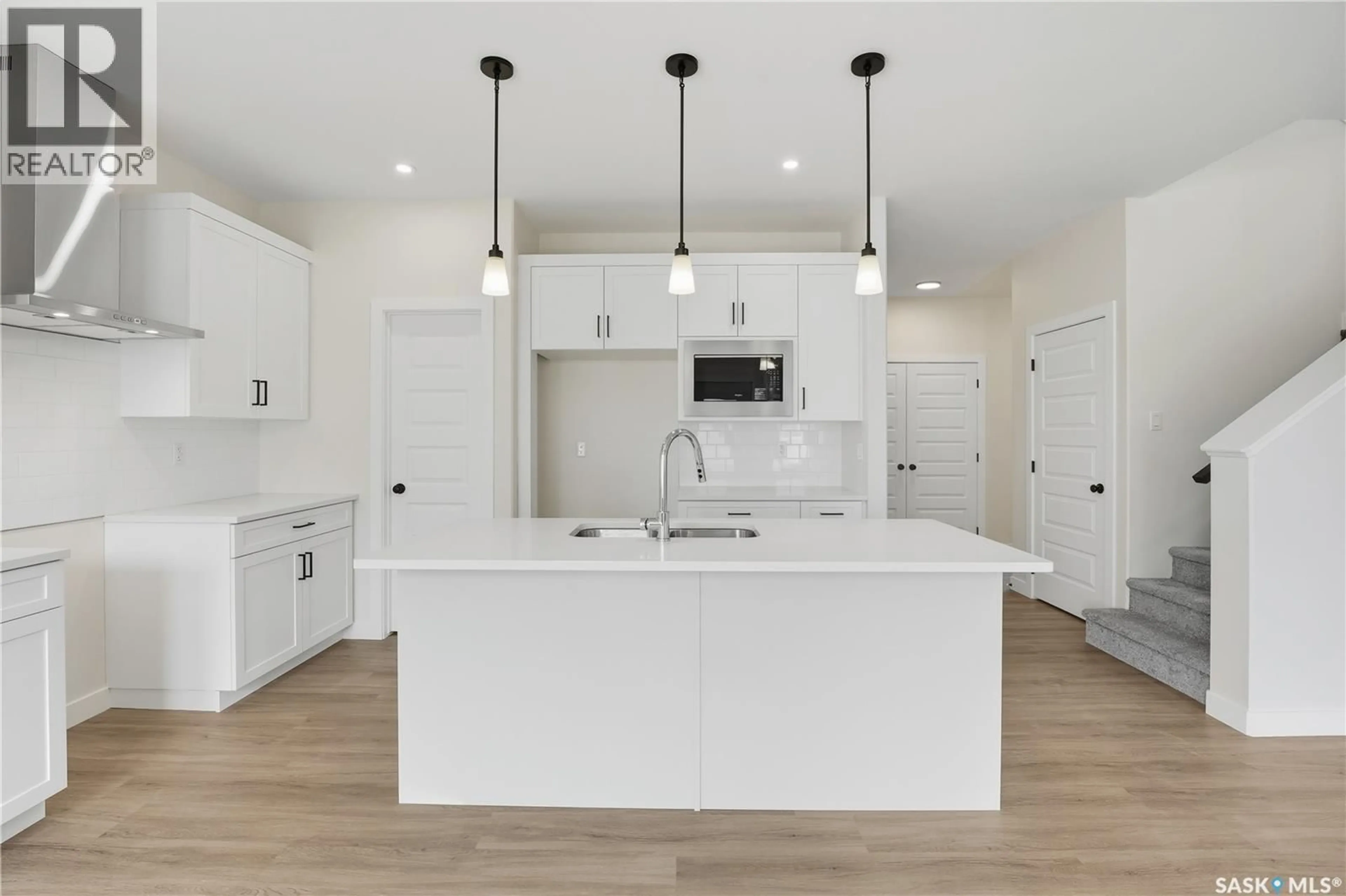 Open concept kitchen, ceramic/tile floor for 692 NAZARALI LANE, Saskatoon Saskatchewan S7V1X5
