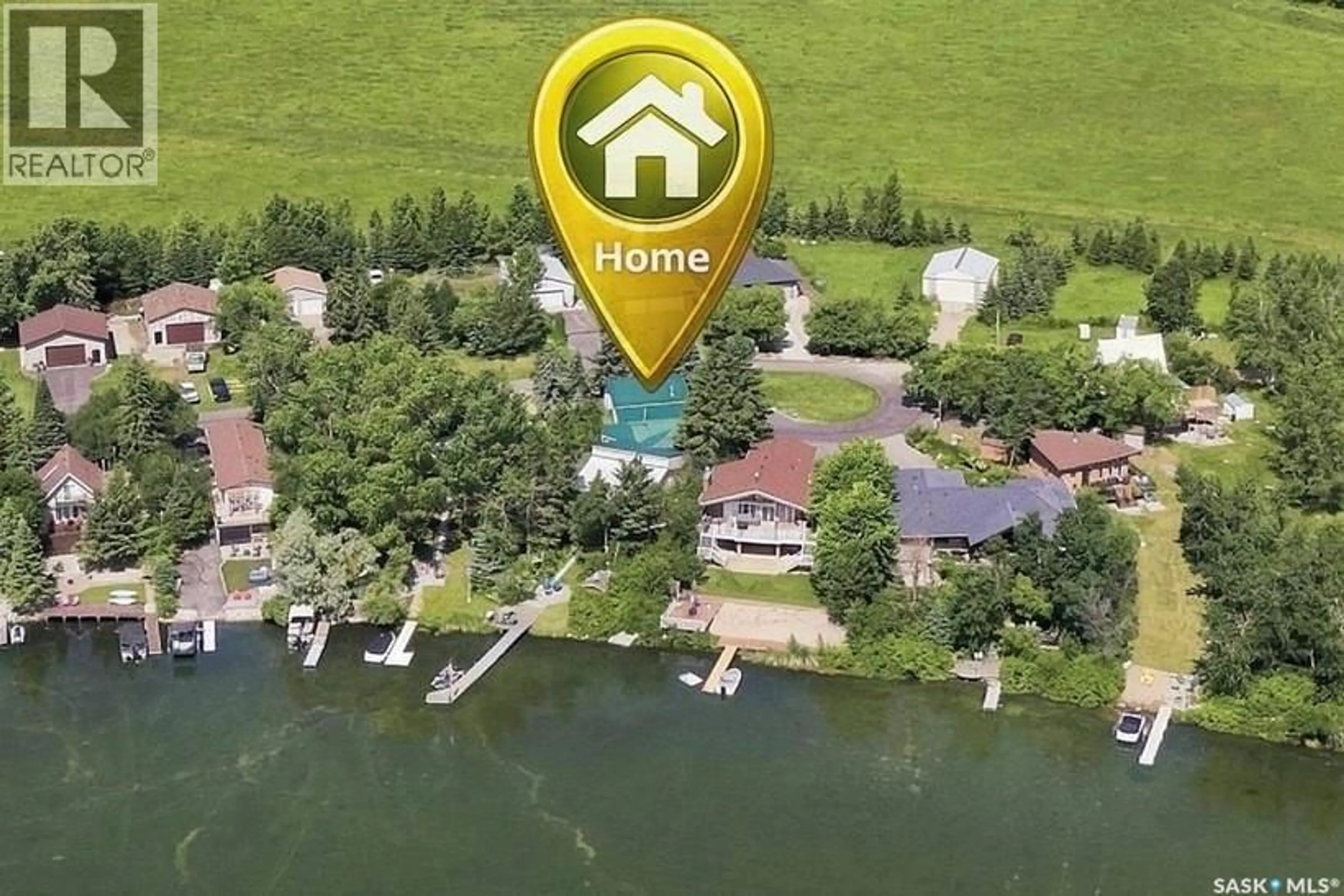 A pic from outside/outdoor area/front of a property/back of a property/a pic from drone, water/lake/river/ocean view for 5205 SIBA BEACH, Wakaw Lake Saskatchewan S0K4P0