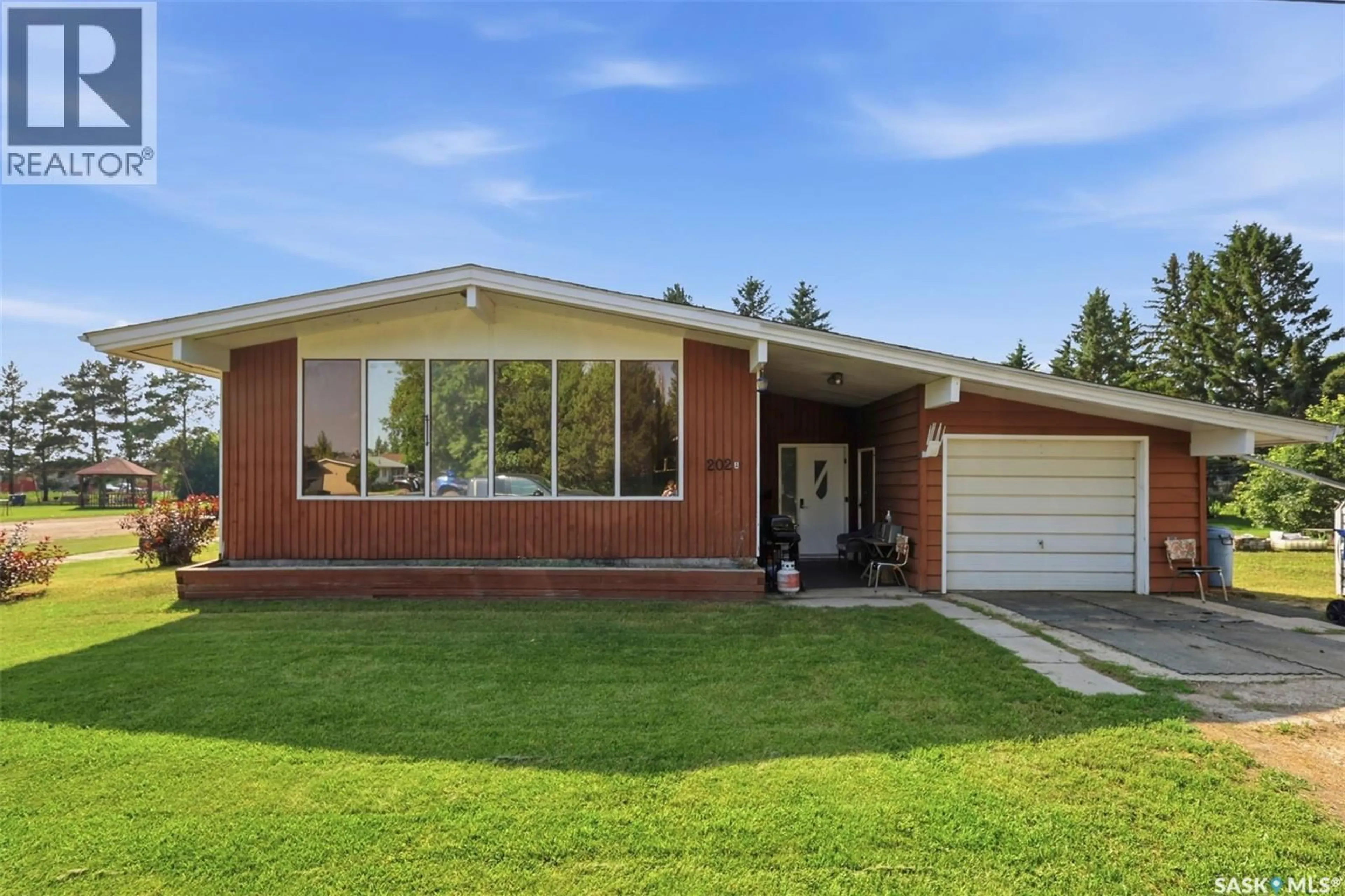 Home with brick exterior material, street for 202 PRINCESS AVENUE, Hafford Saskatchewan S0J1A0